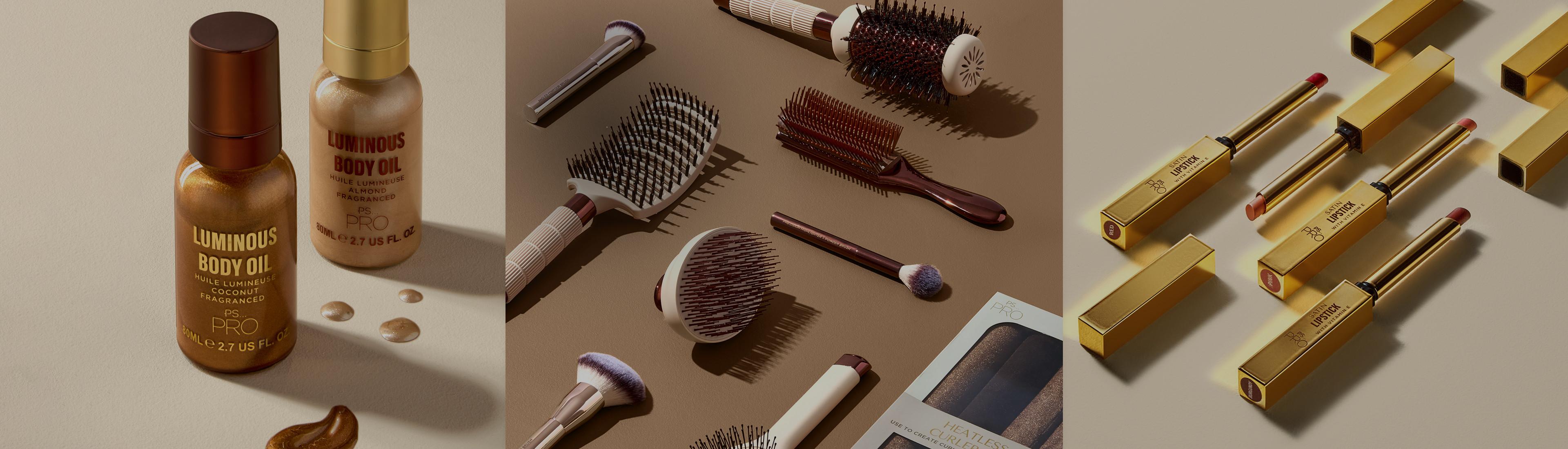 Collection de produits de beauté comprenant des huiles corporelles lumineuses, des brosses à cheveux assorties et des rouges à lèvres dorés.