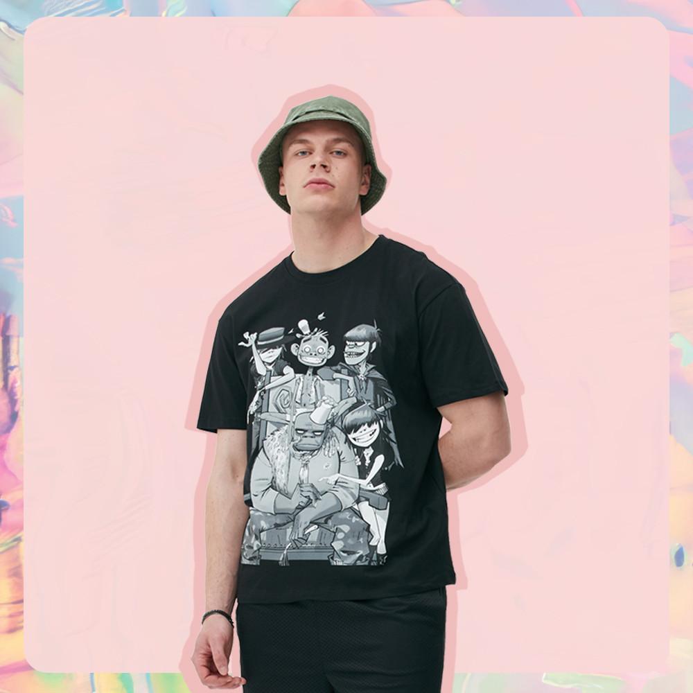 Model wearing bucket hat and band tee