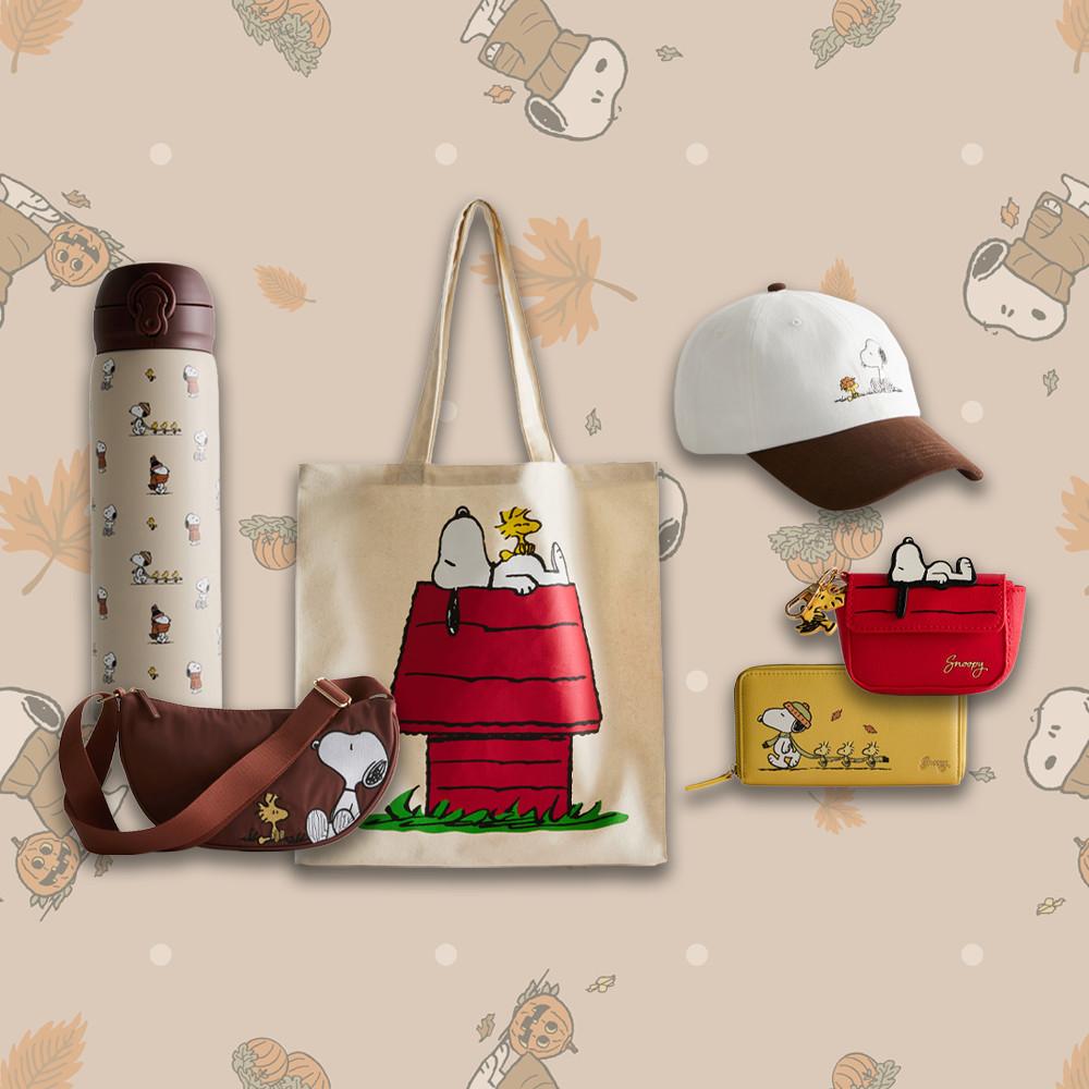 Snoopy-themed collection including thermos, baseball cap, tote bag, crossbody bag and yellow wallet.