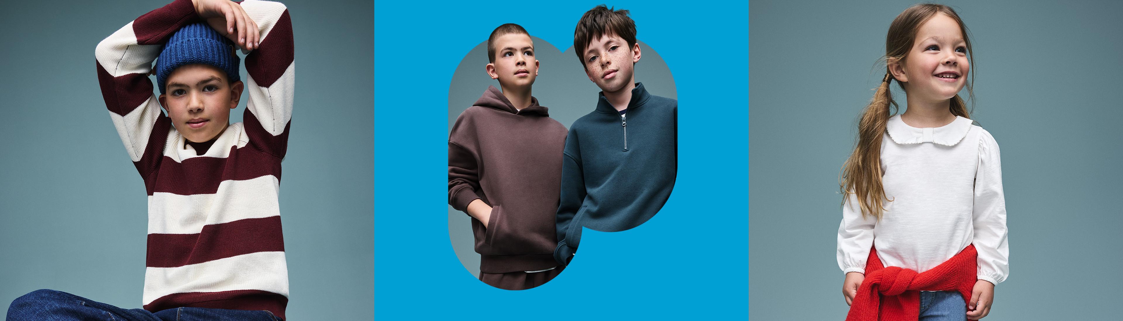 Child wearing burgundy and white striped sweater with blue beanie, two boys in hooded sweatshirts, girl in white collared blouse and red cardigan.