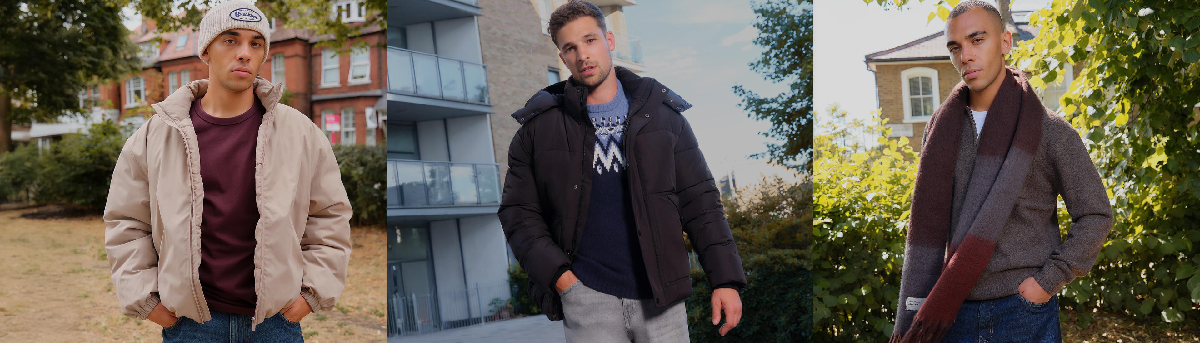 Trois hommes portant des vêtements d'automne et d'hiver, dont une veste beige, une doudoune noire et un pull gris avec une écharpe.
