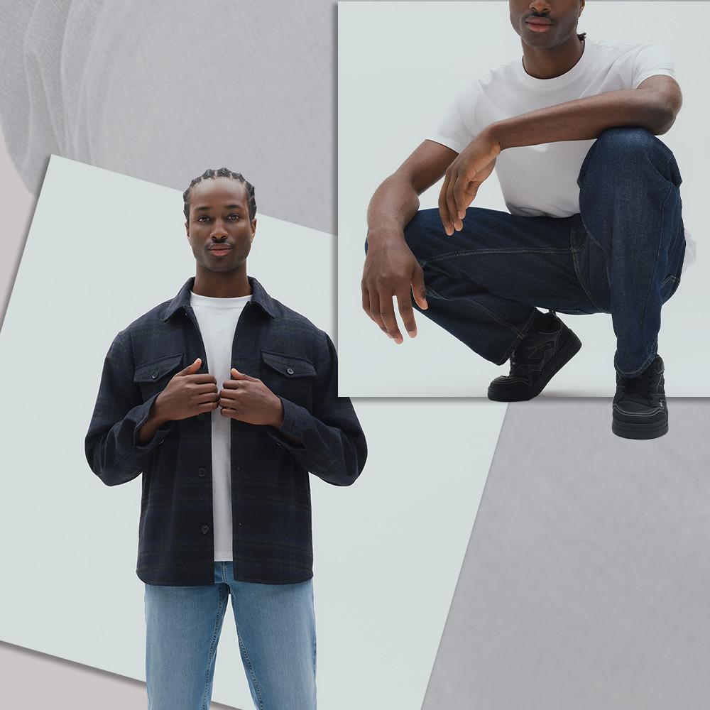 Two models wearing casual denim outfits with white T-shirts and dark jackets, one standing and one crouching.