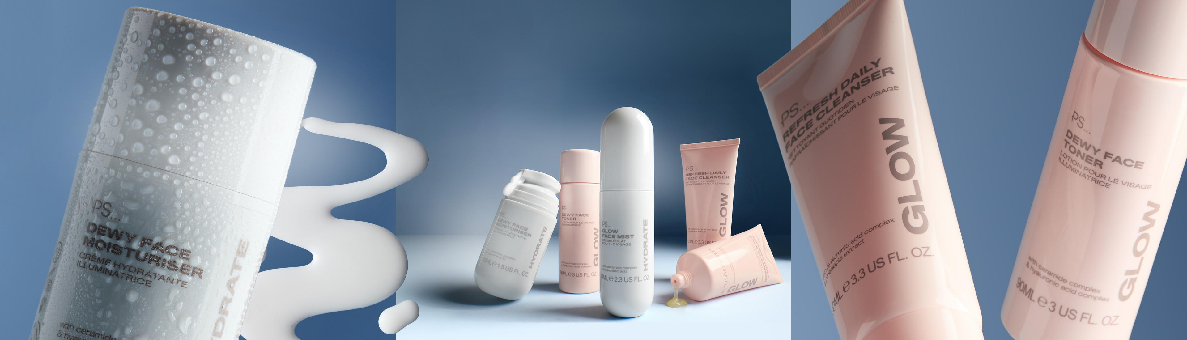 Collection of pink and white skincare products including cleansers, moisturizers and facial mists arranged together.