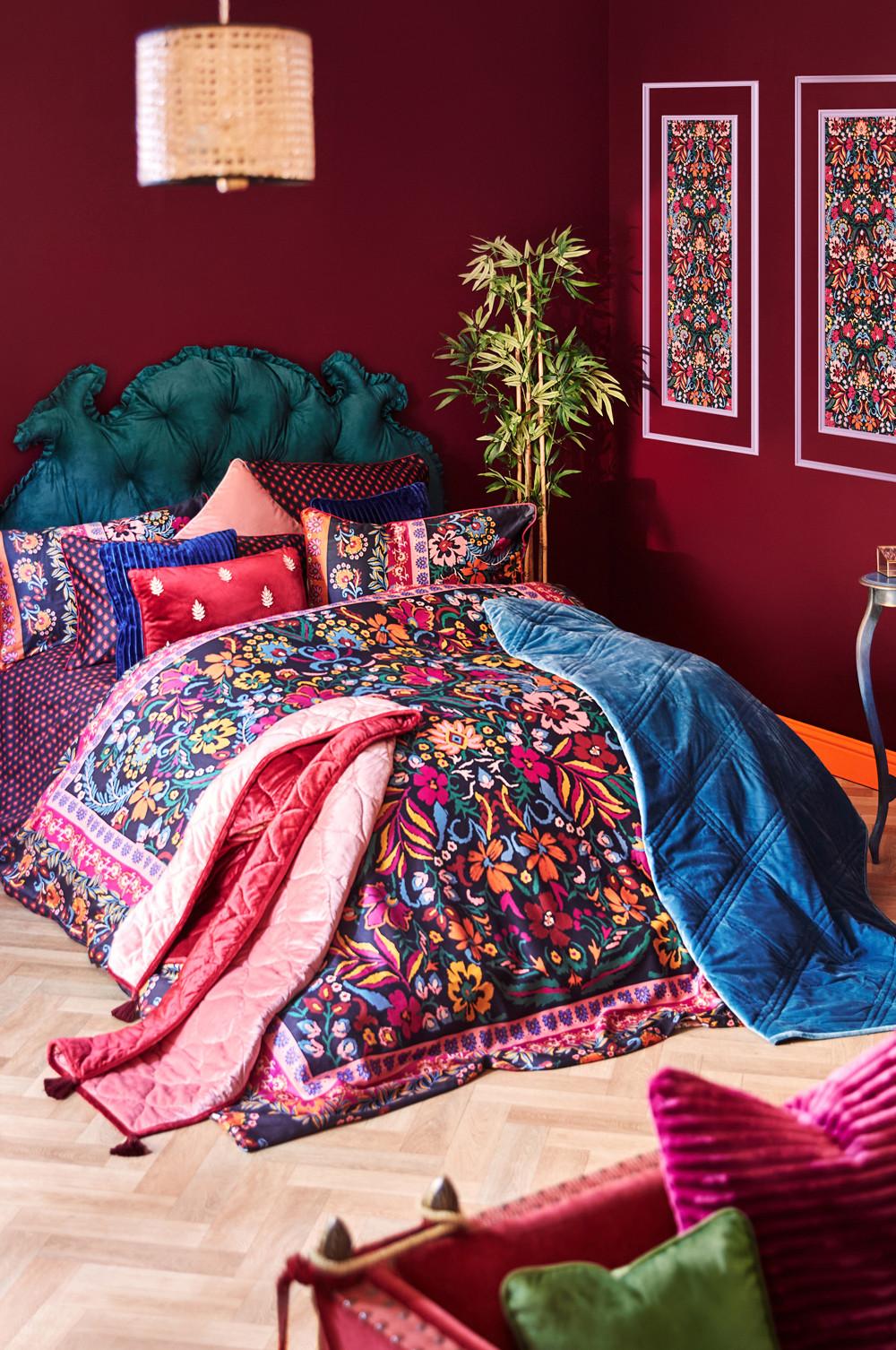 Patterned duvet cover and pillows, with blue blanket