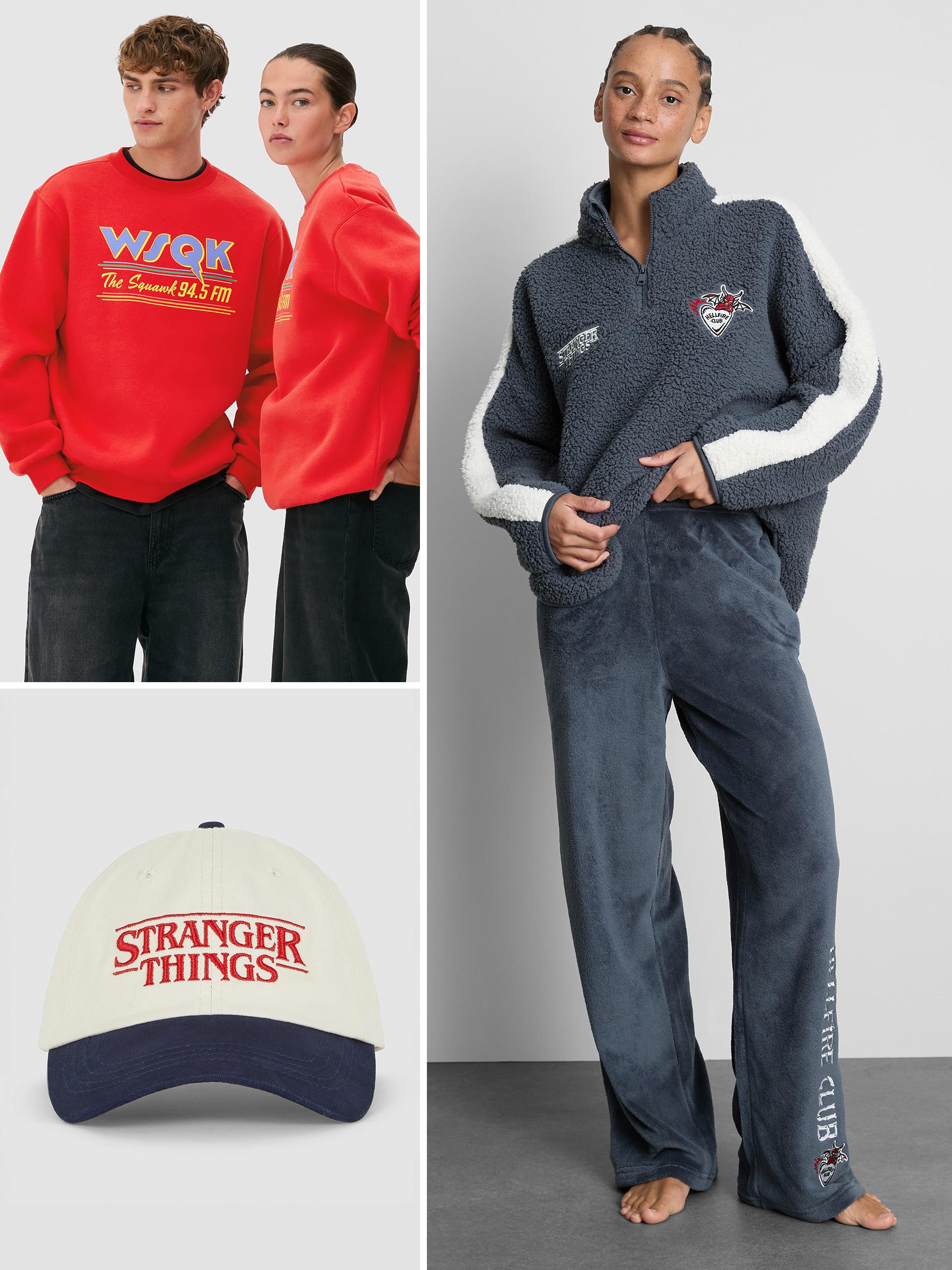 Stranger Things collection featuring red WSQK sweatshirts, grey fleece pullover, and cream baseball cap.