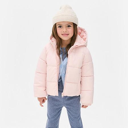 Cream waistcoat with red and brown floral pattern, featuring front pockets and button closures. Striped lining visible at neckline.