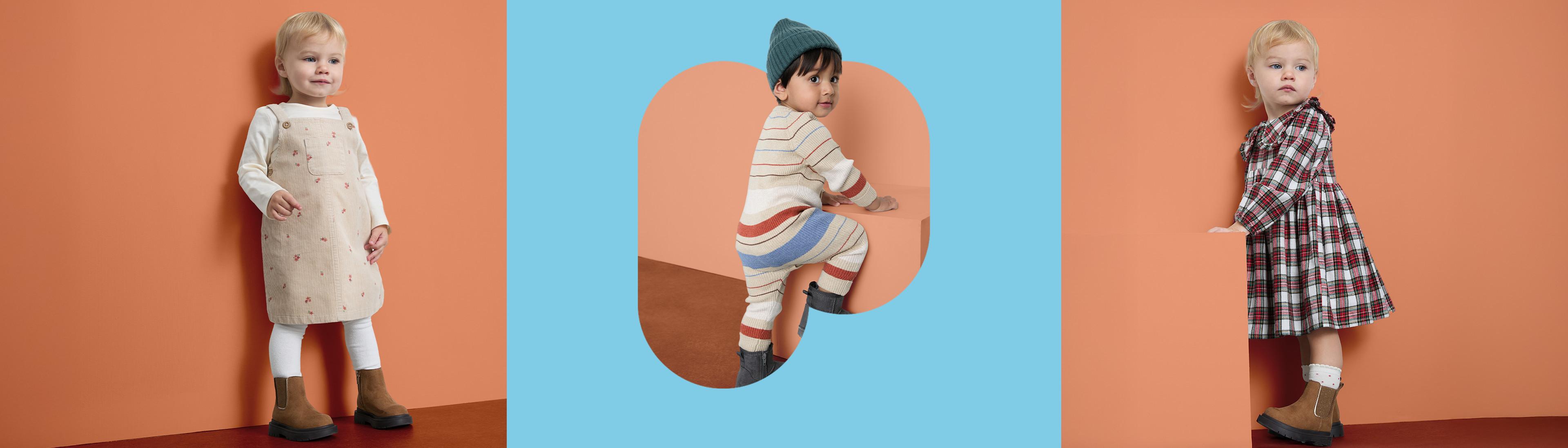 Három gyerek különböző stílusú ruhákban: egyikőjük kötényruhában, a másik csíkos szettben kötött sapkával, a harmadik kockás ruhában, csizmával.