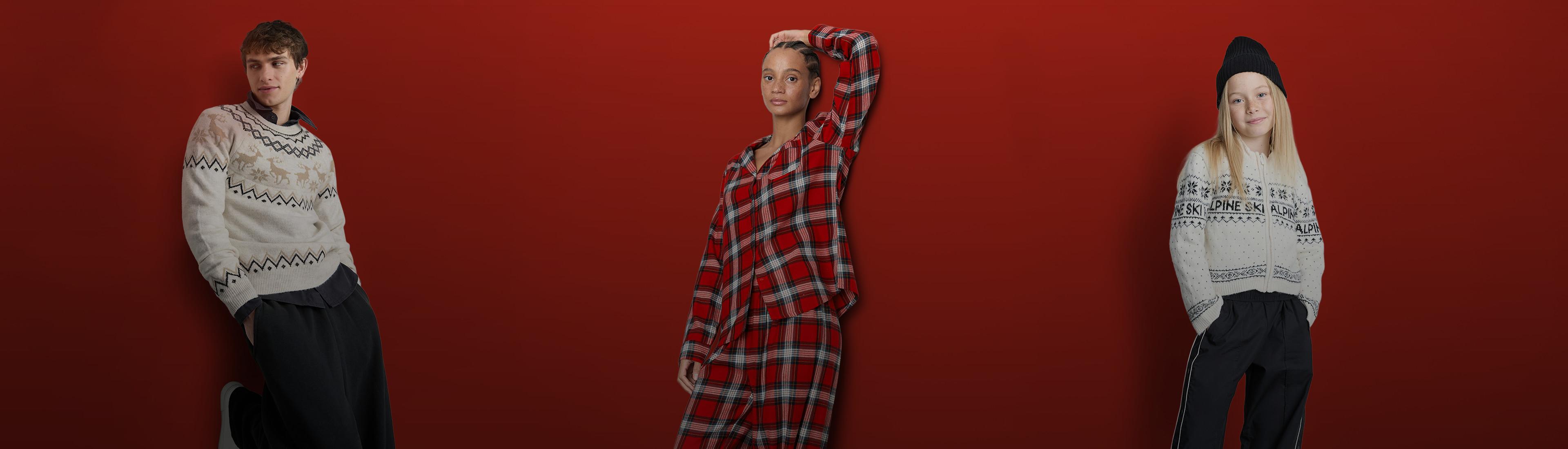 Three people posing against a red background, wearing winter fashion including knitted jumpers and plaid clothing.
