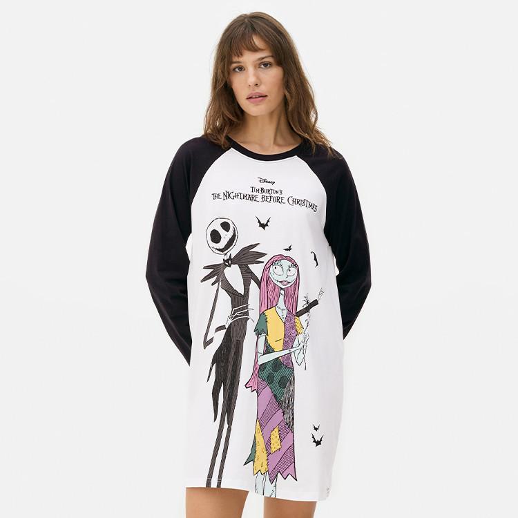 Woman wearing Disney Nightmare Before Christmas raglan nightshirt featuring Jack Skellington and Sally graphics.