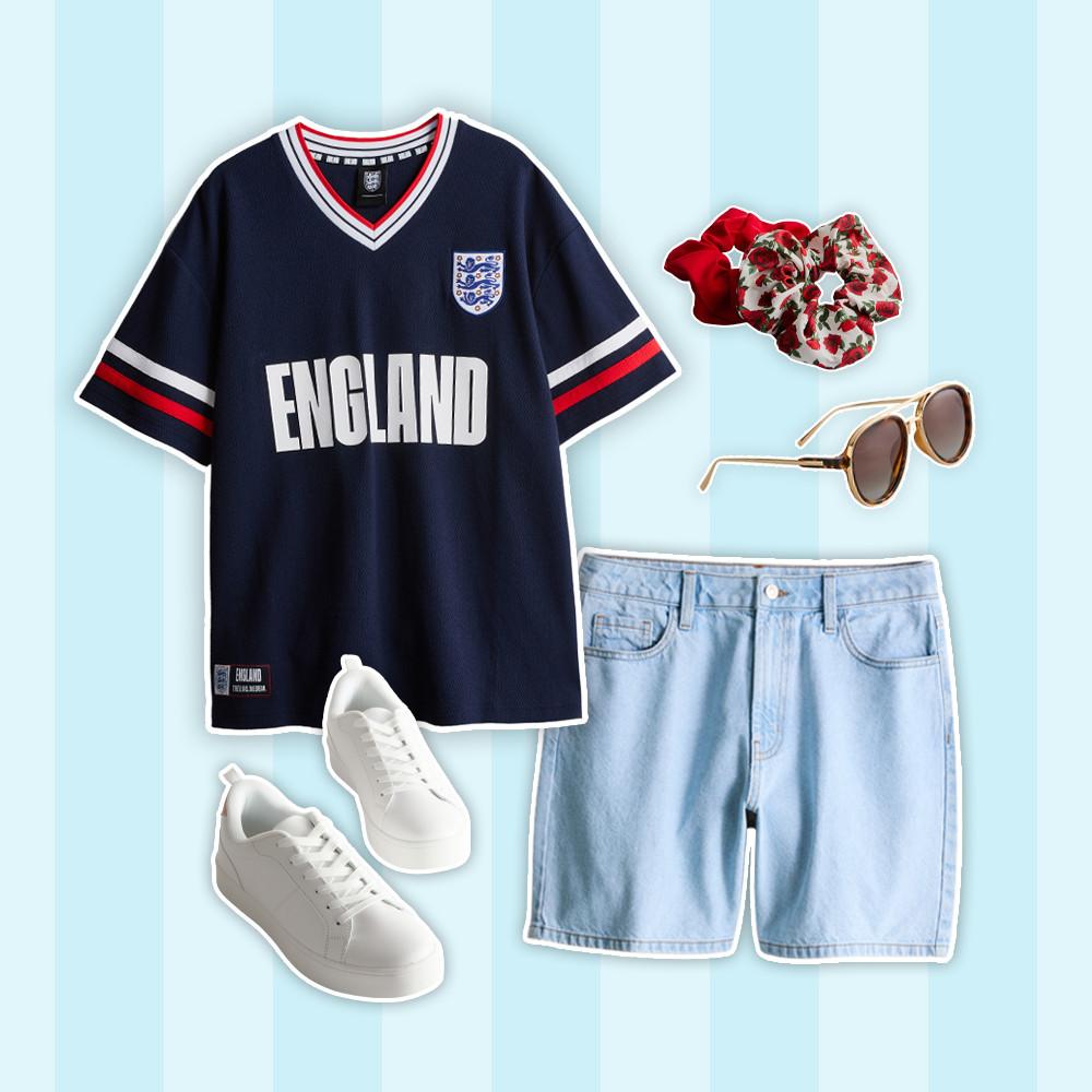Navy England football shirt styled with light denim shorts, white trainers, sunglasses and hair scrunchies.