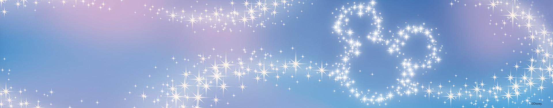 Sparkling stars trail across a blue and purple gradient background forming a Disney-inspired design.