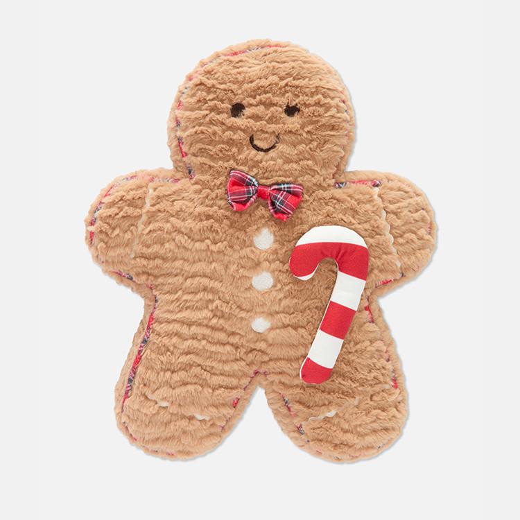 Christmas bedding set with Santa, penguins, reindeer and festive scenes on red and white duvet cover.