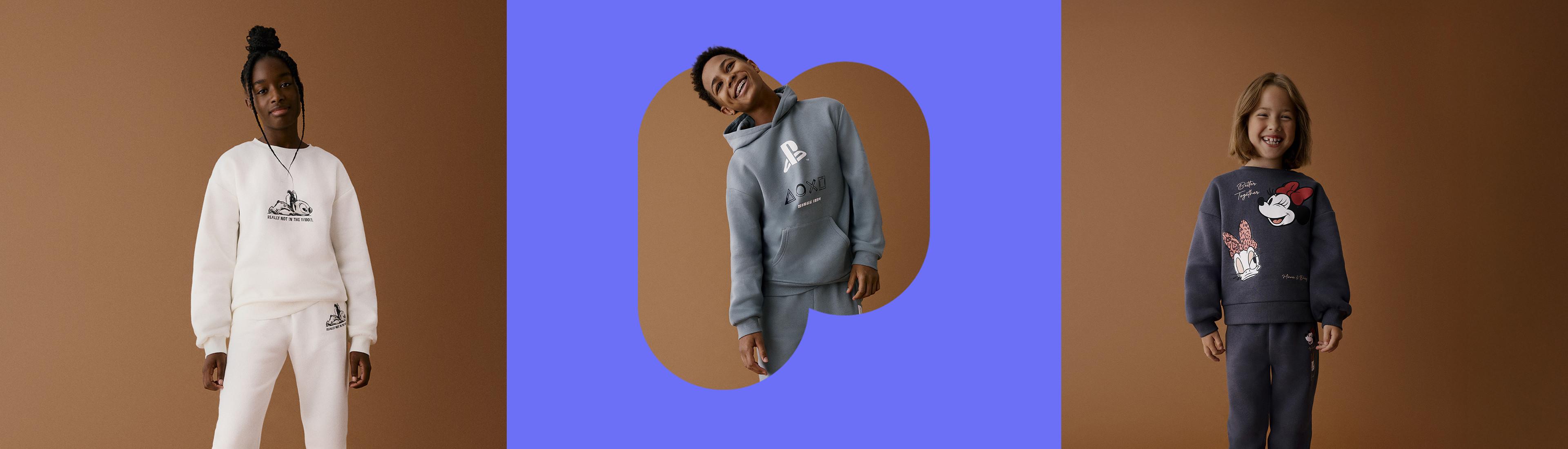Children modelling casual sweatshirts and joggers, including a white set, grey PlayStation hoodie, and navy Minnie Mouse design.