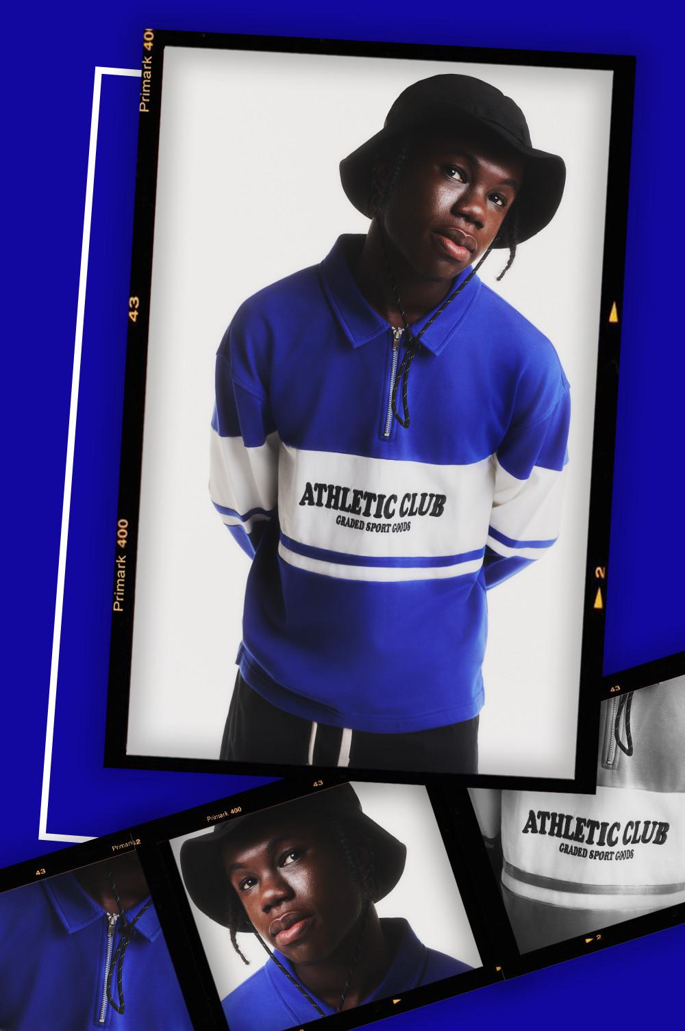 Model wears blue Athletic Club quarter zip with white stripe