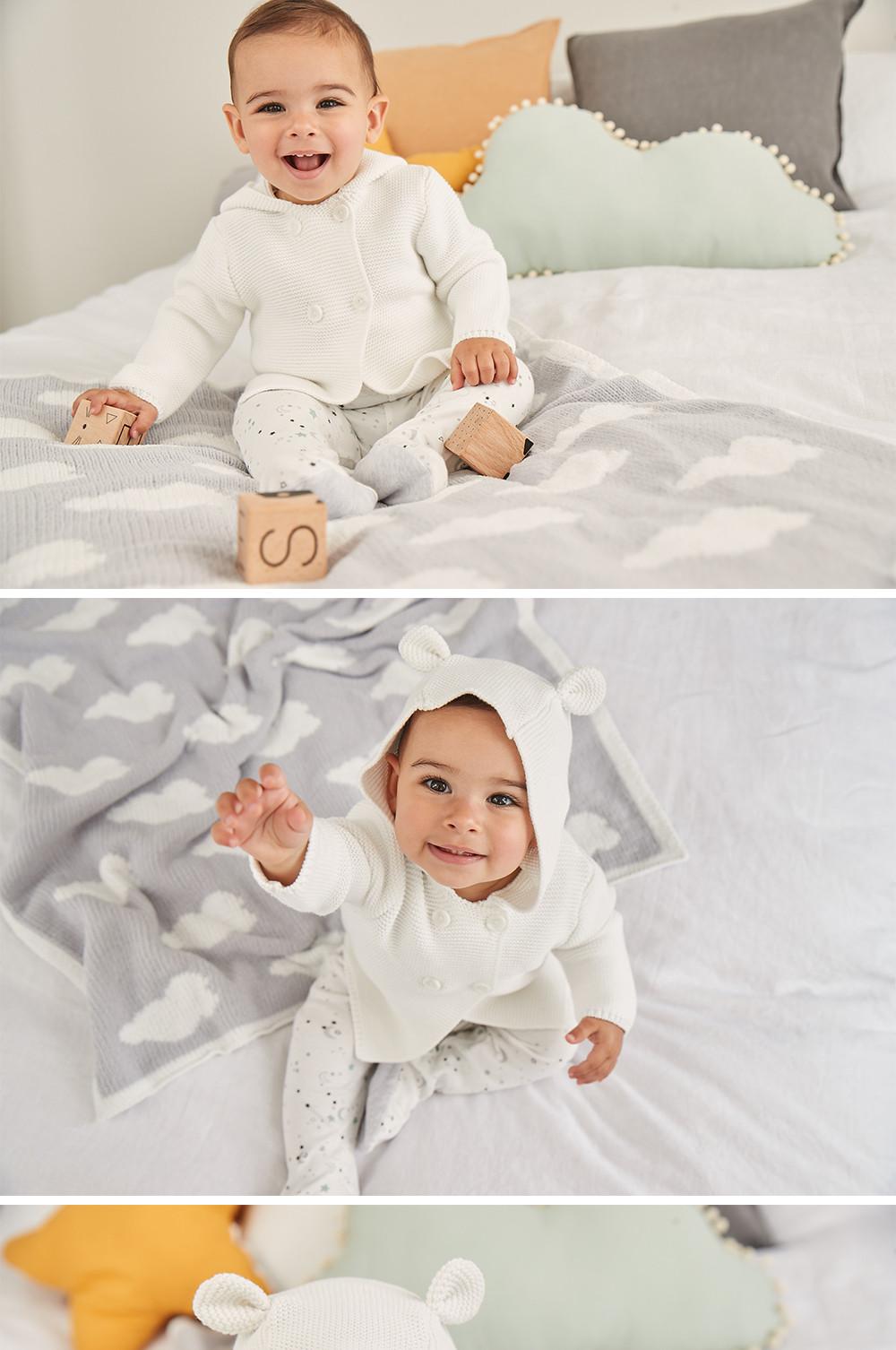 Baby in hooded cardigan and leggings