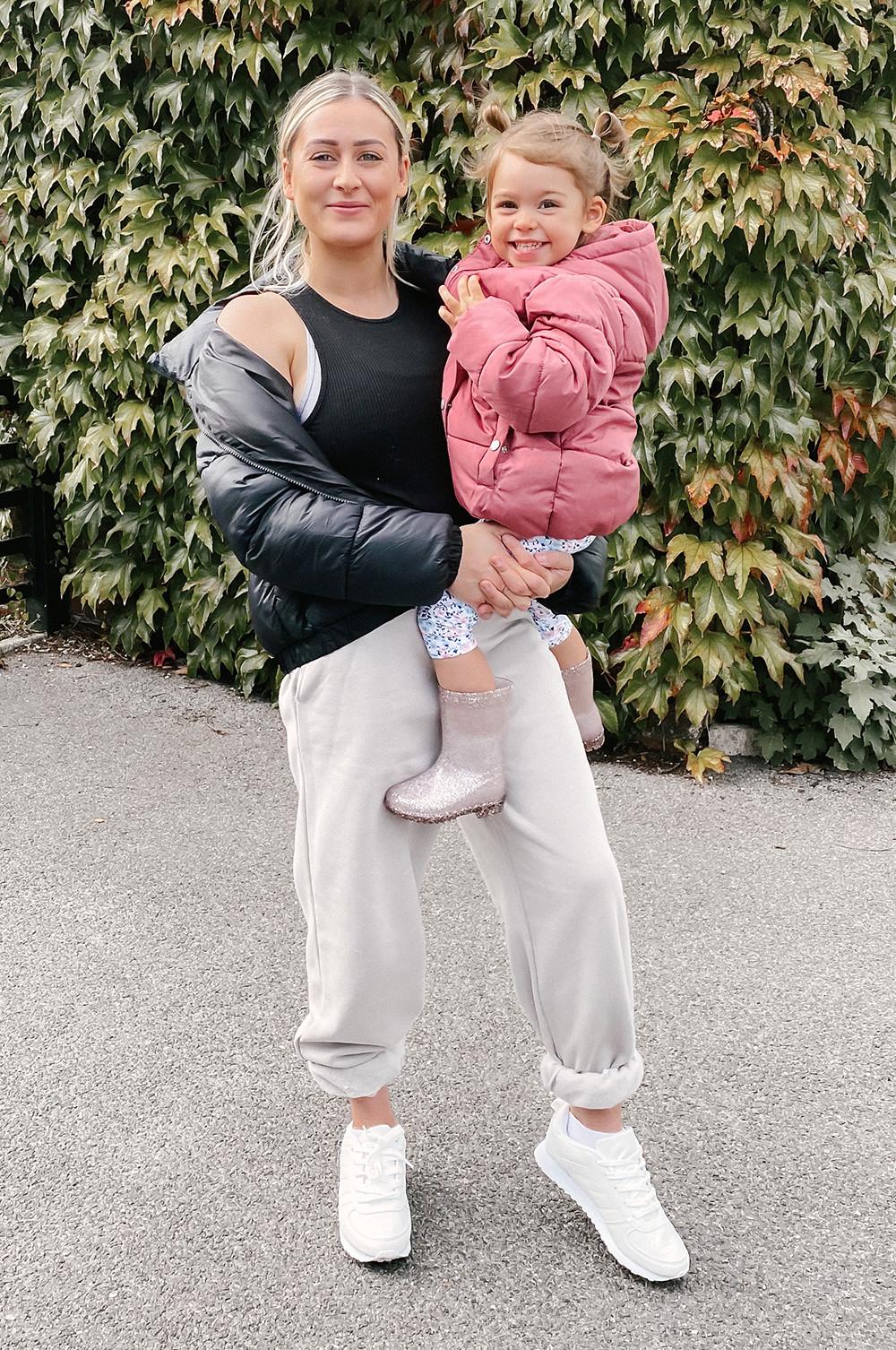 Mum and shop daughter matching coats