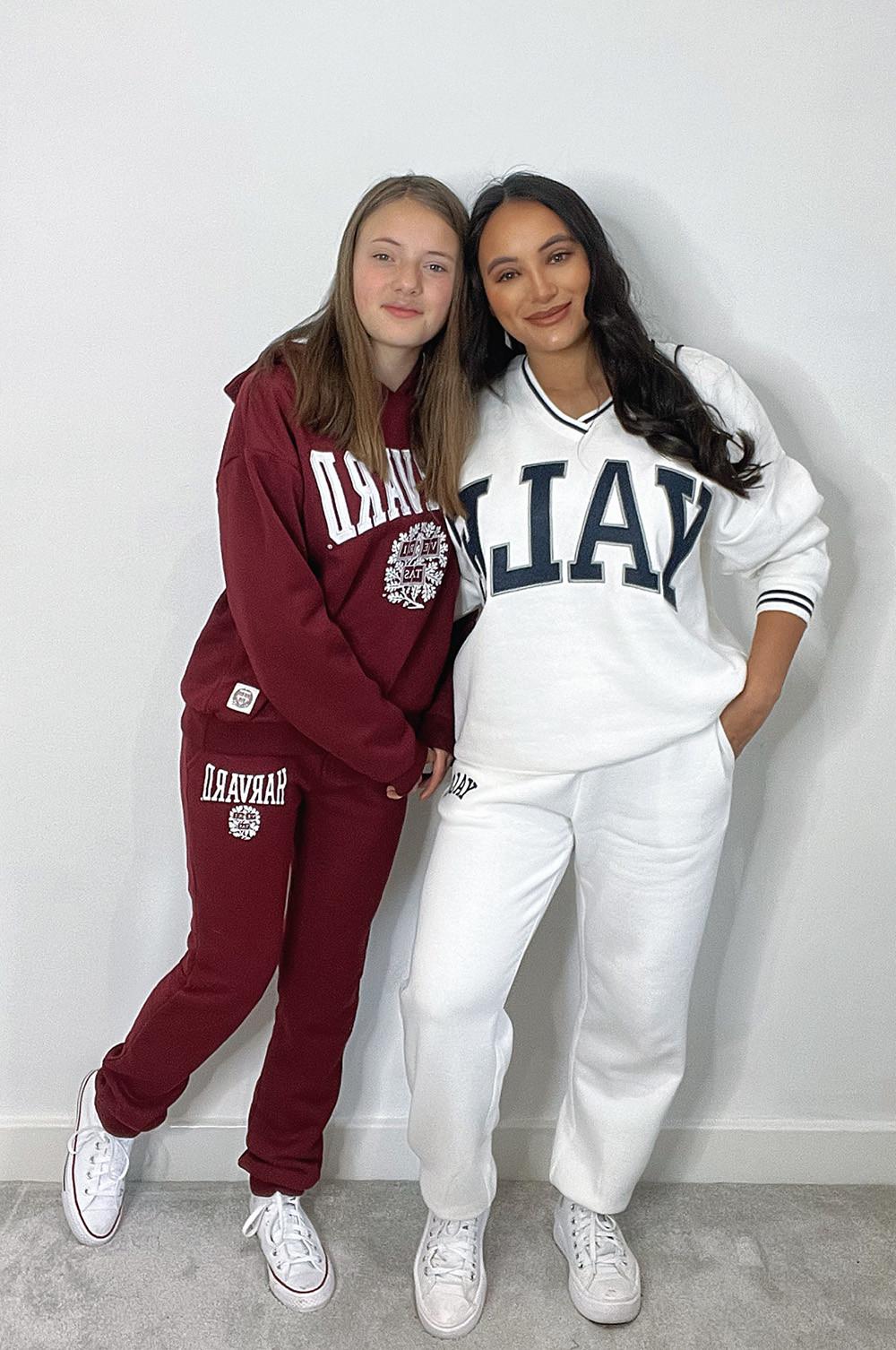 Mothere wears white Yale tracksuit, whilst Daughter wears burgundy Harvard tracksuit