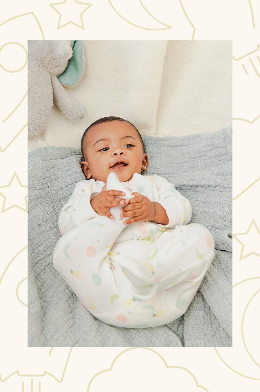 White patterned sleepsuit