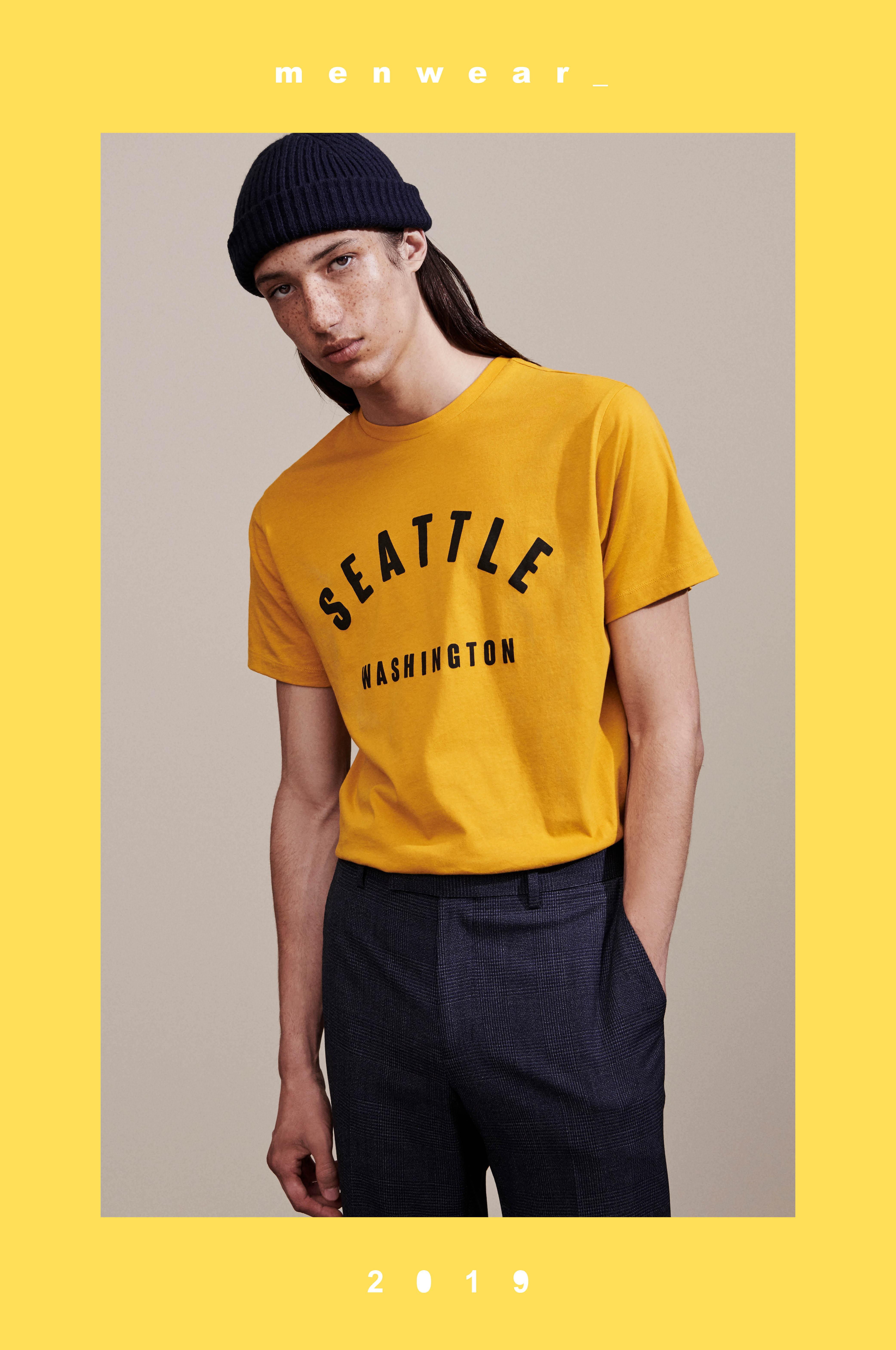 Male in yellow city t-shirt