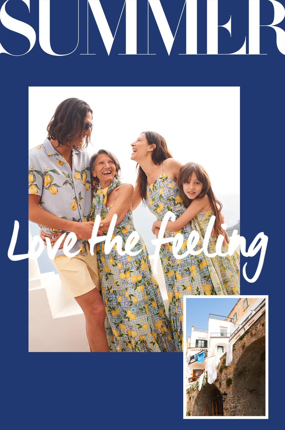 Family laugh whilst wearing the lemon print collection