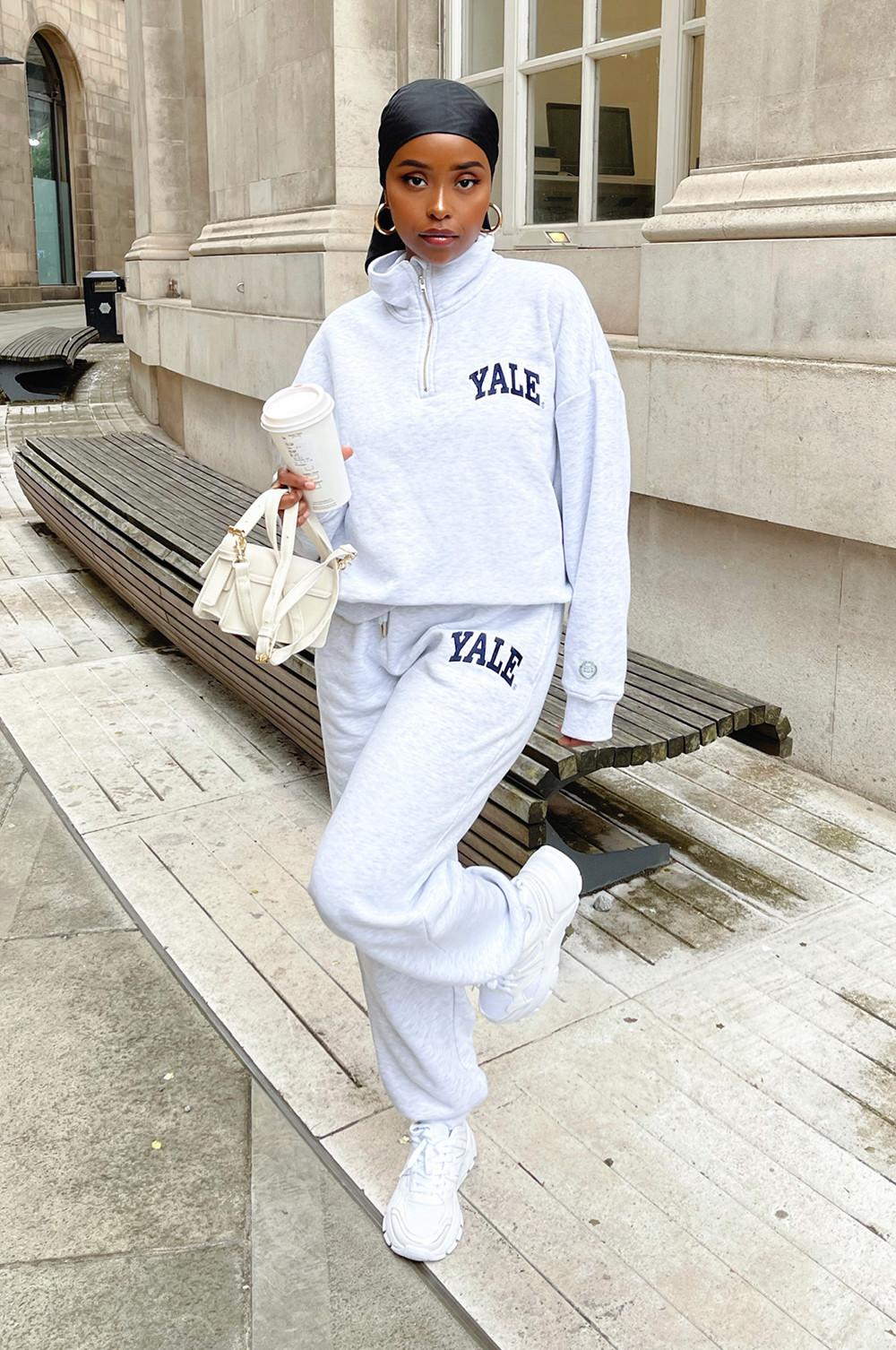 Model standing in matching top and joggers