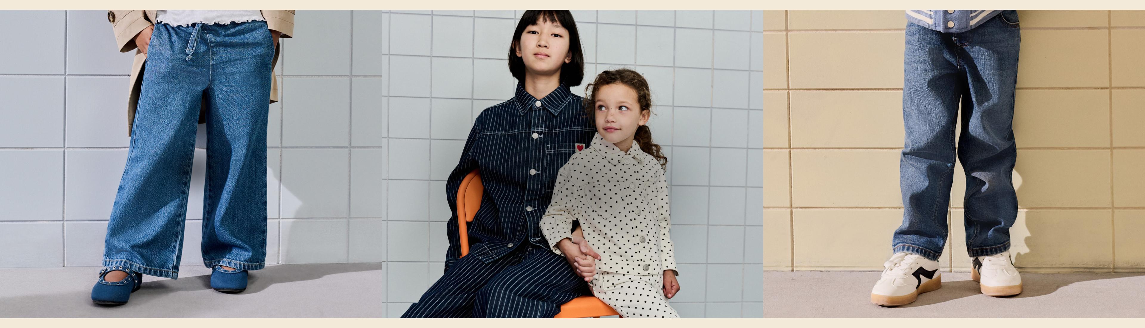 Moda per bambini con jeans in denim, un completo gessato blu navy e un abito color panna a pois su sfondo piastrellato.