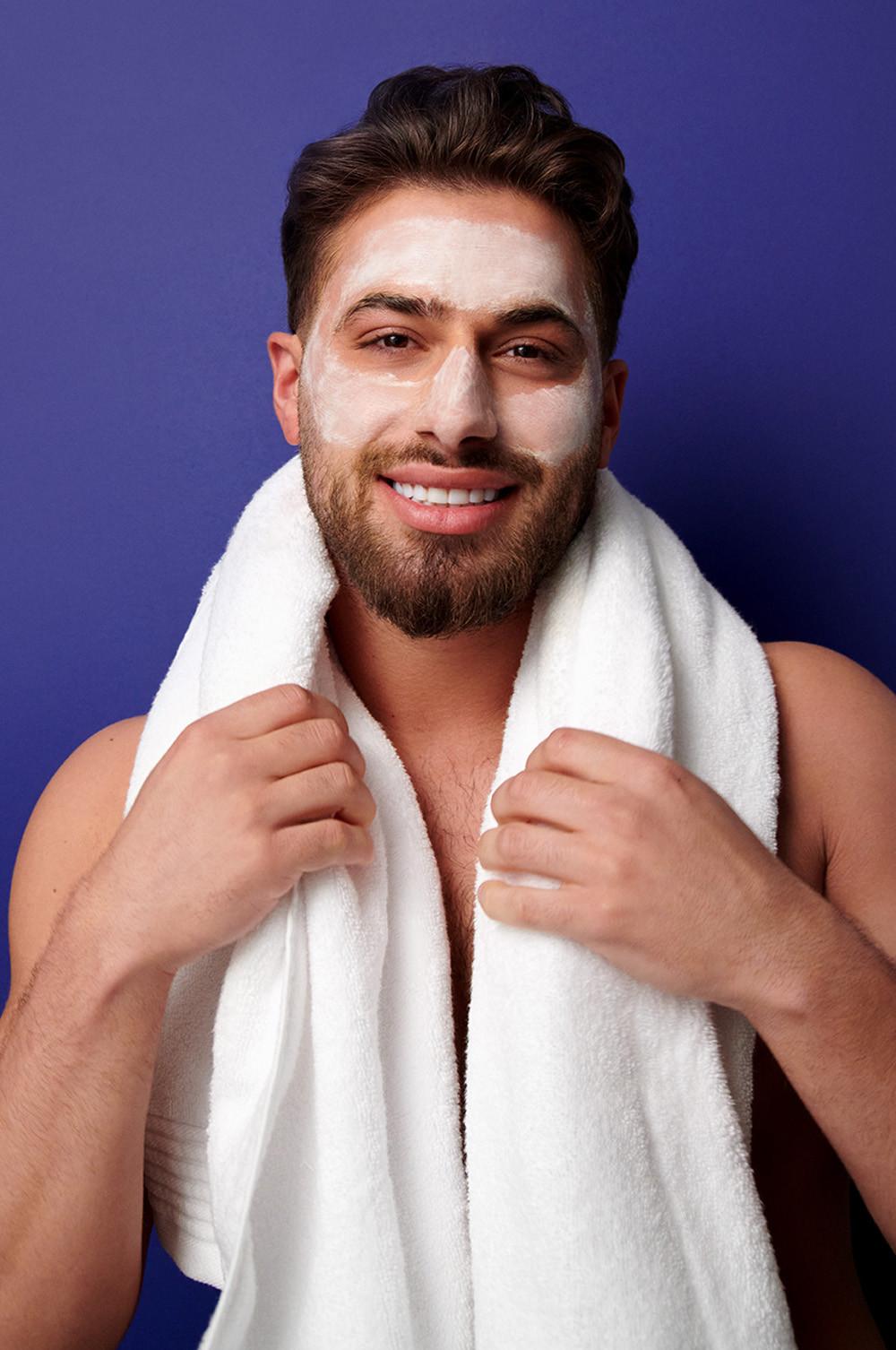 Kem wearing face mask