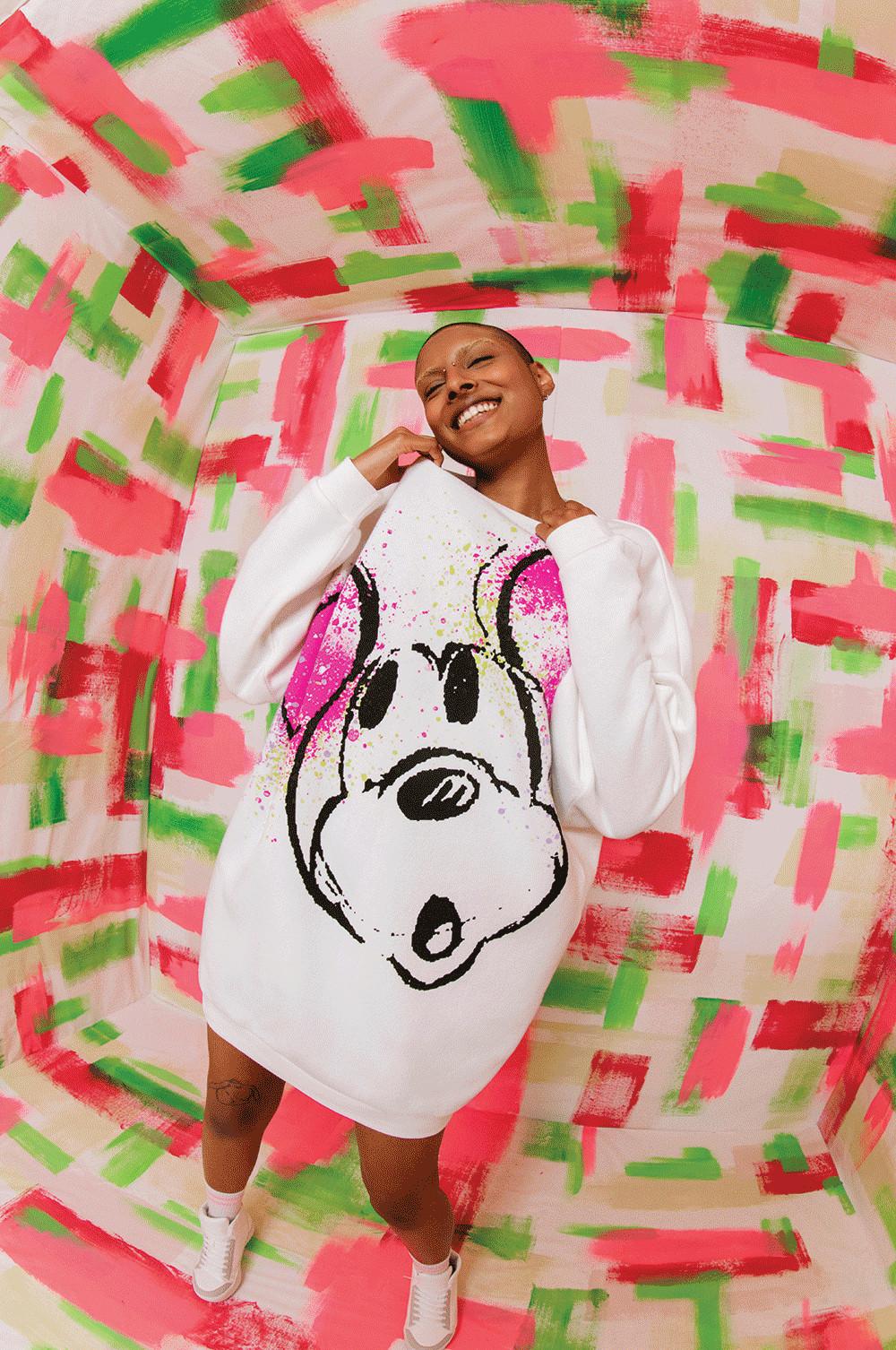 Model wearing White Mickey Mouse Print Sweater Dress