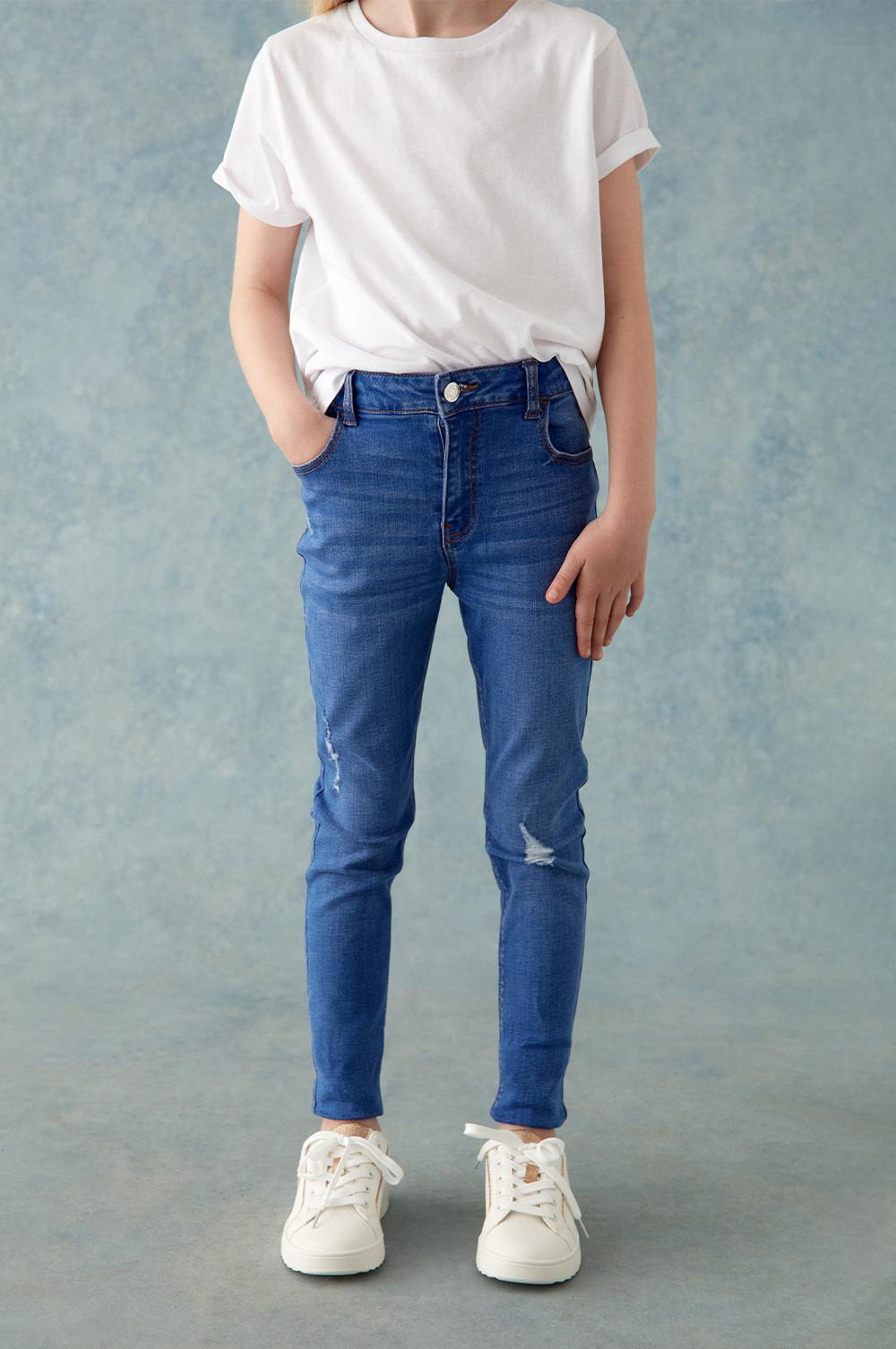 Skinny jeans met scheuren