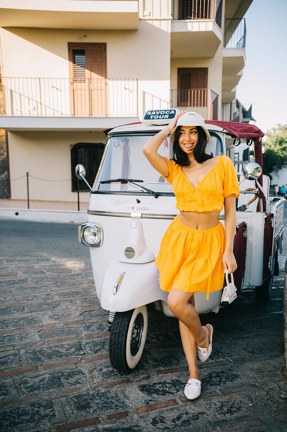 Model wears orange coord