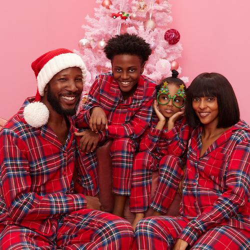 Family in matching tartan pyjamas