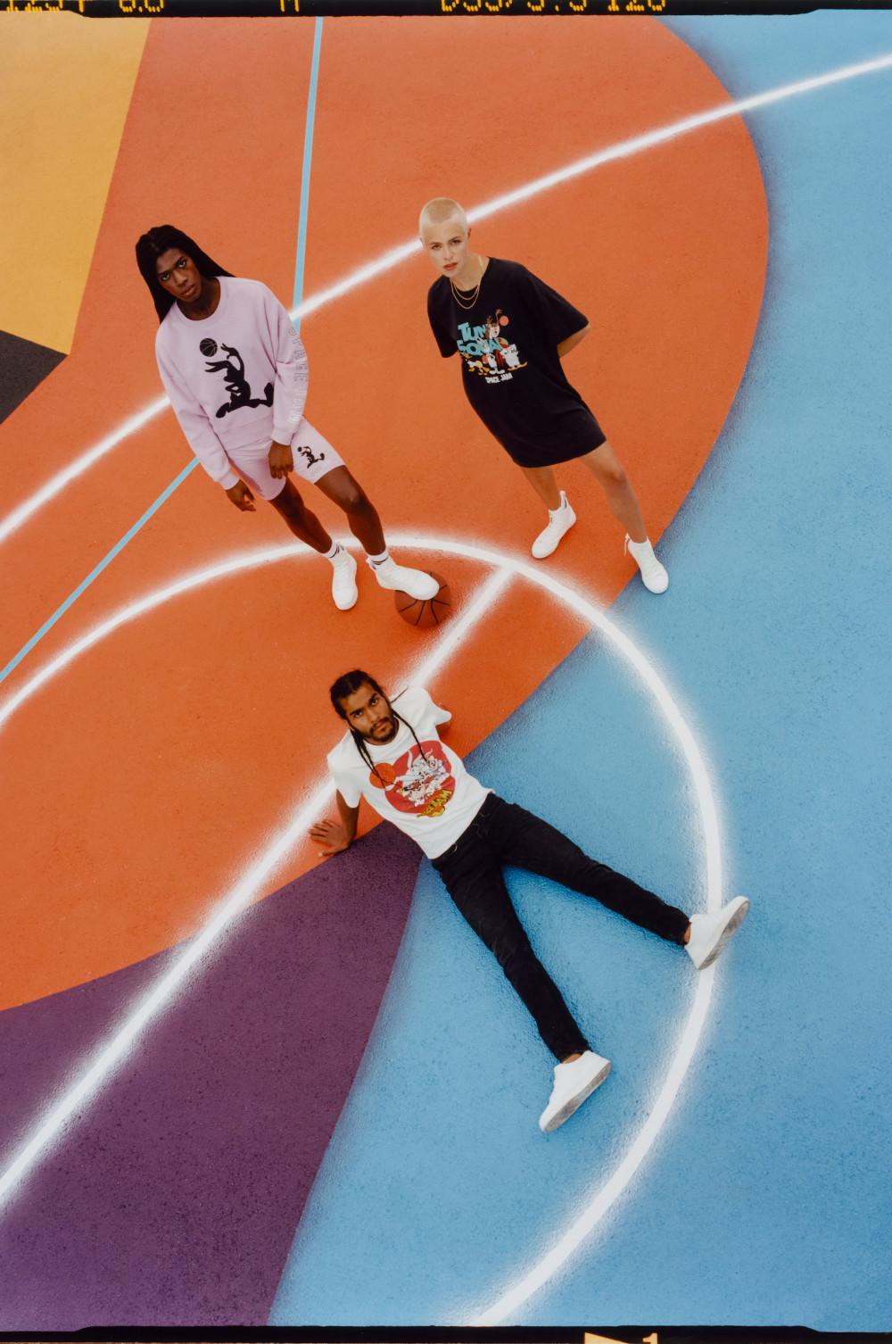 Models wearing Space Jam clothing on coloured background