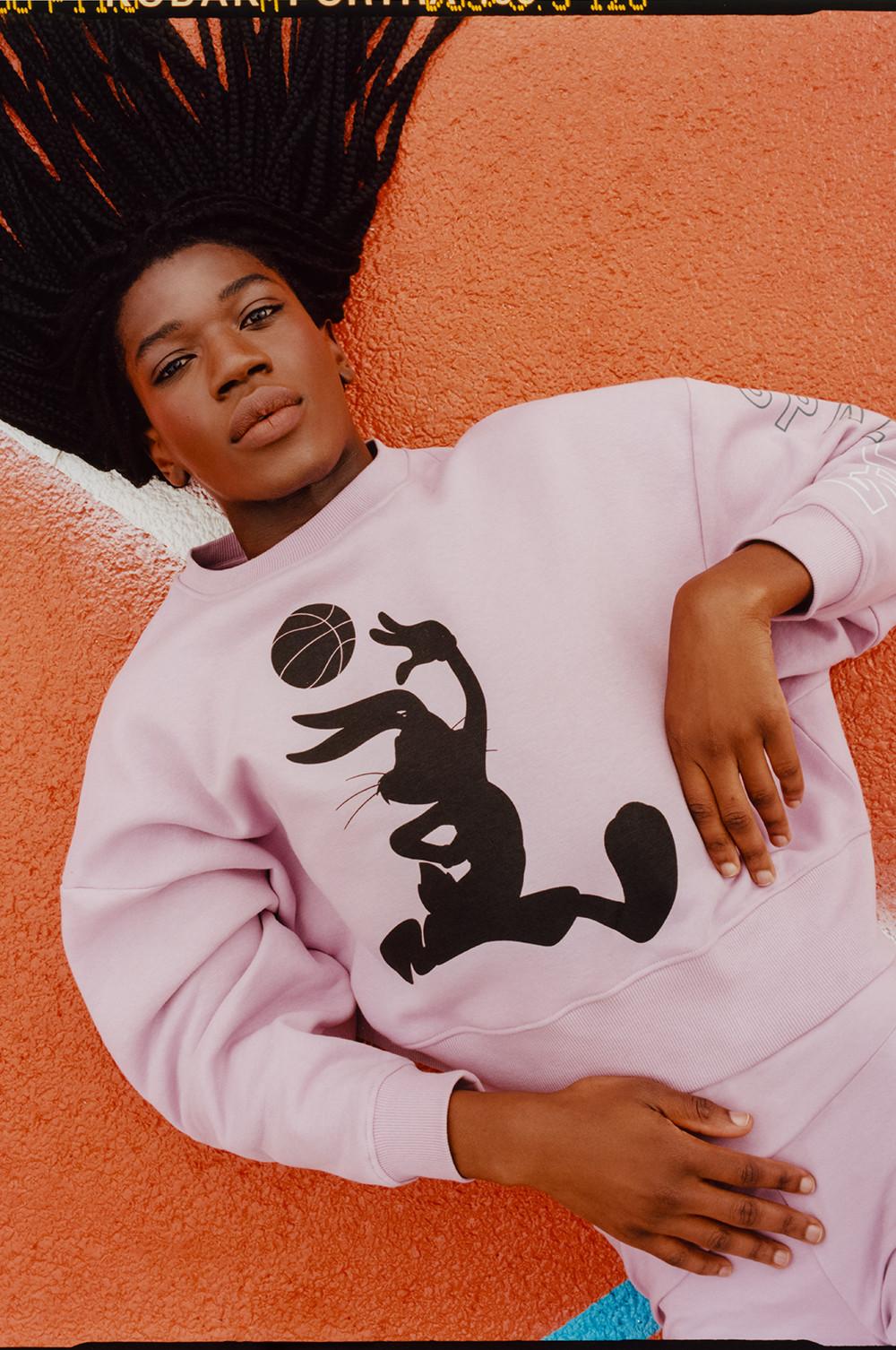 Model Wearing Pink Space Jam Sweatshirt