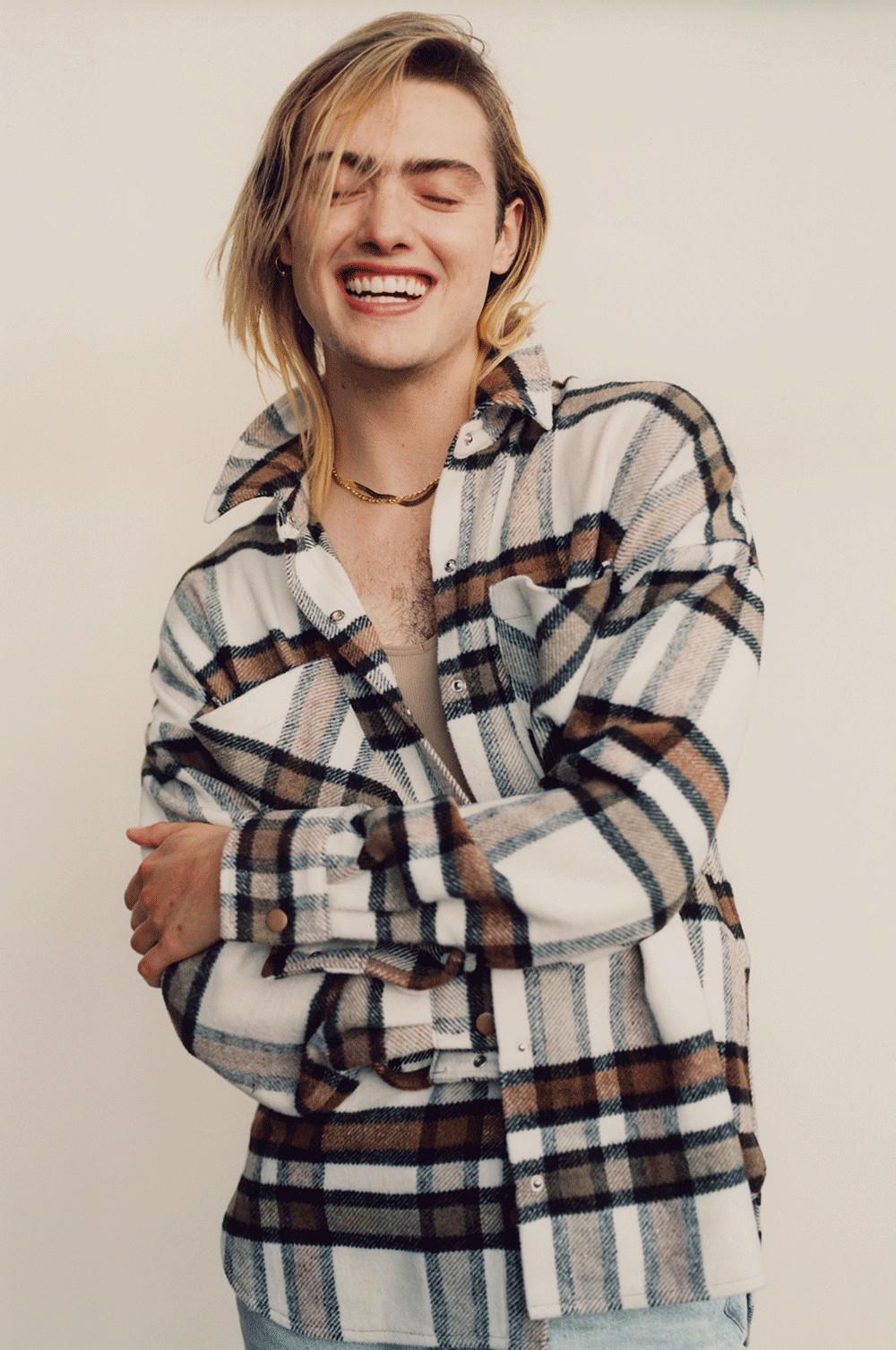 Model wearing Brown Check Overshirt and jeans