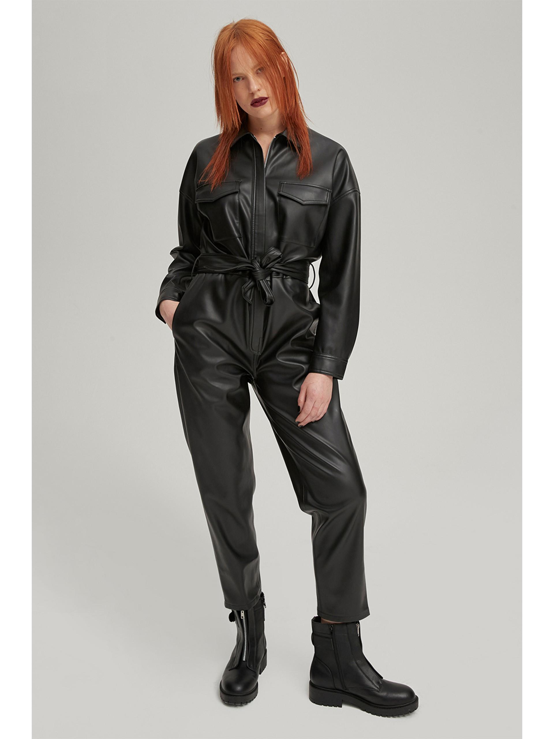 woman in utility jumpsuit