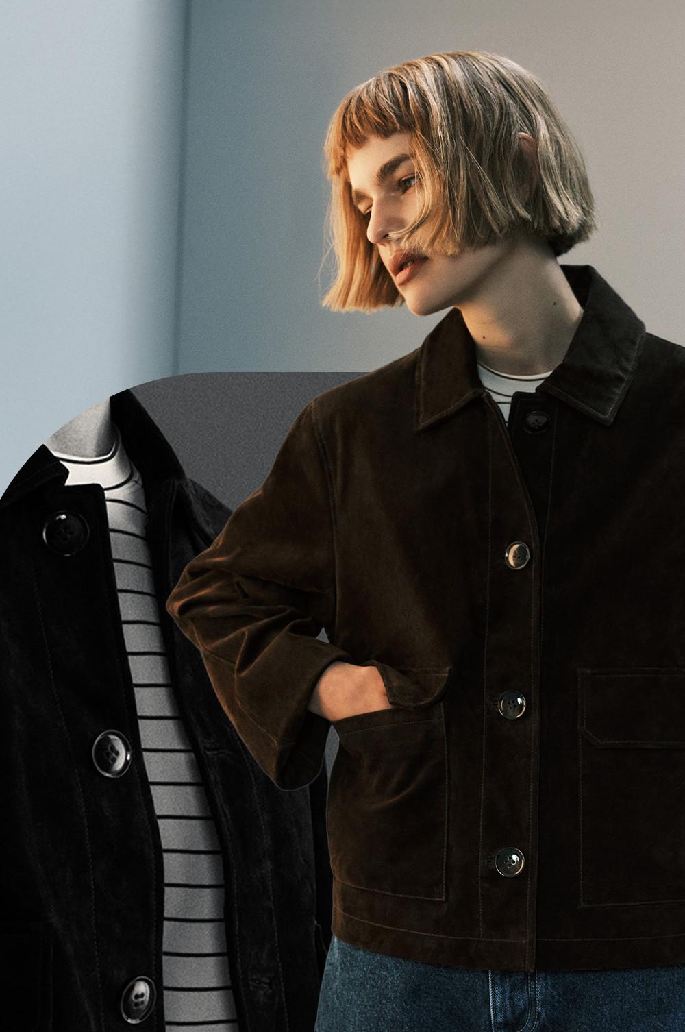 Person wearing a brown velvet jacket with button details over a striped top, styled with a bob haircut.