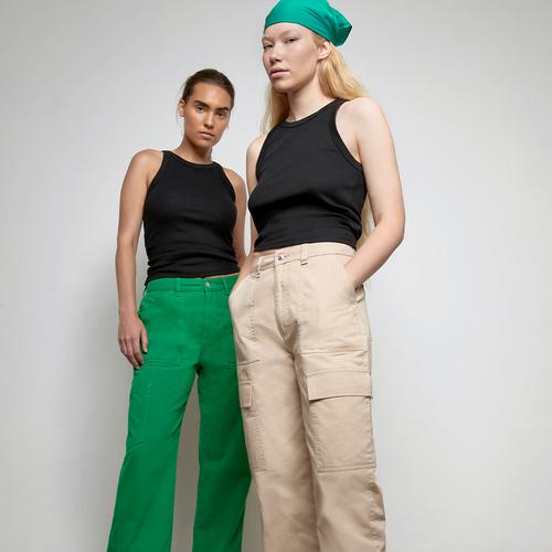 Models wear coloured cargo trousers and black bodysuits