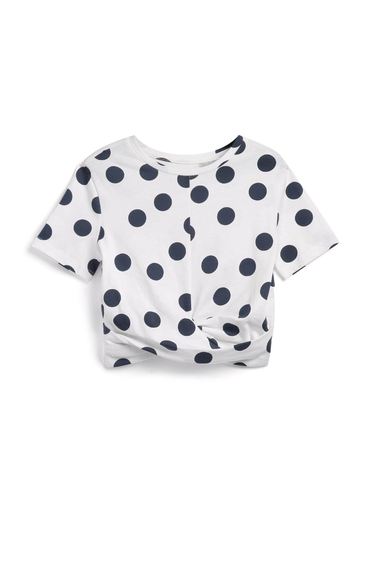 Camiseta de lunares para niña pequeña