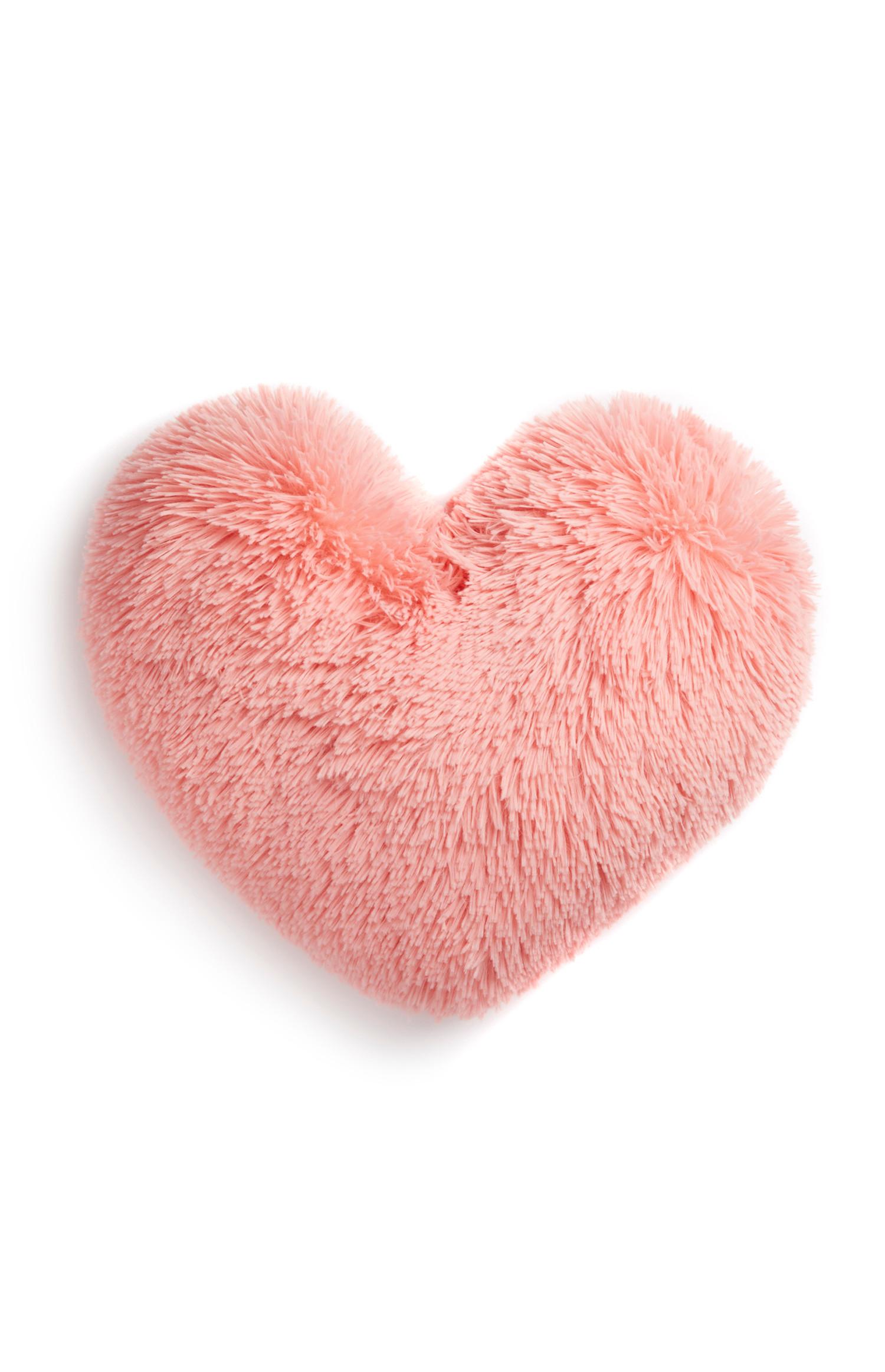 Cojín en forma de corazón rosa