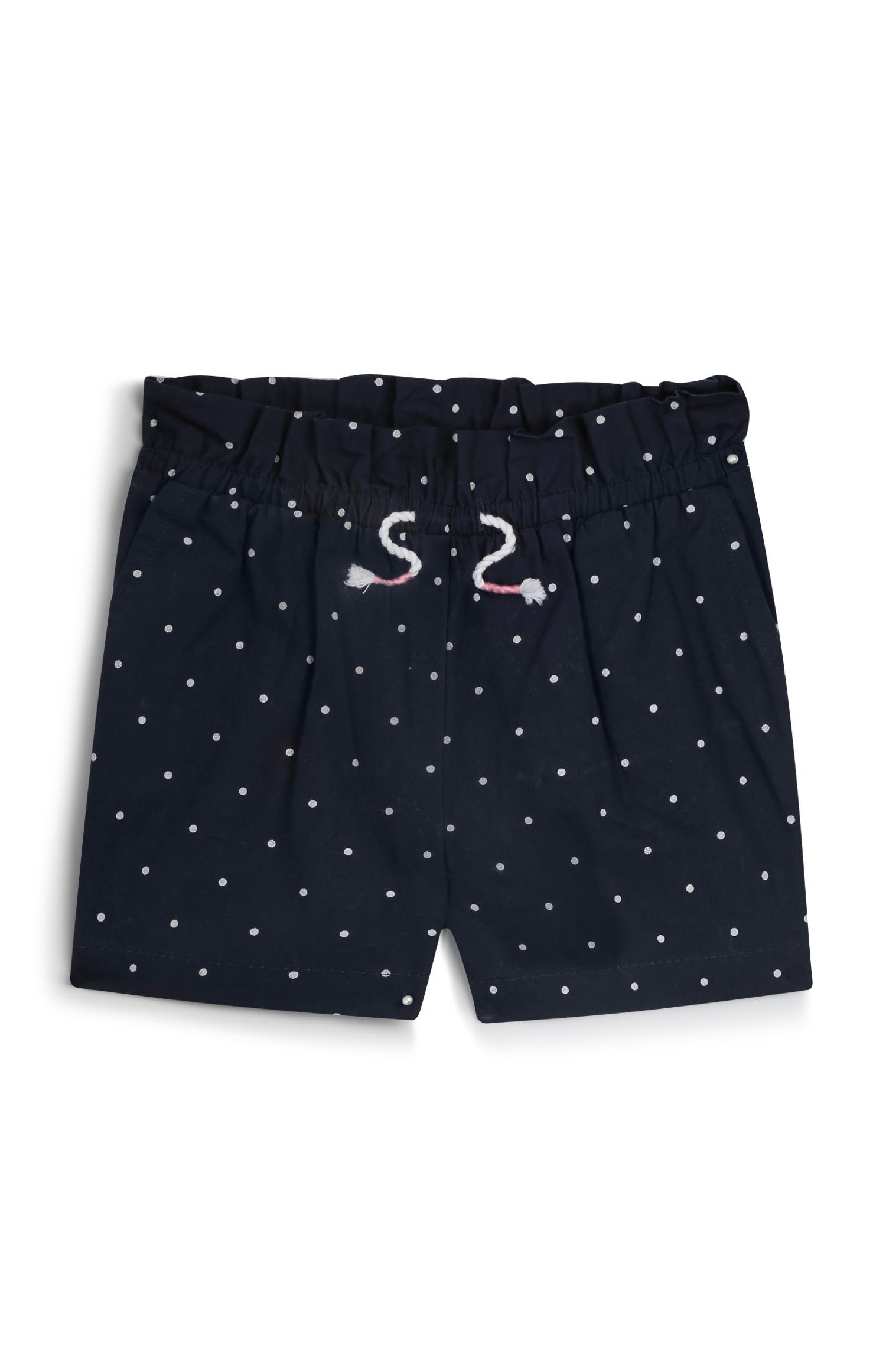 Pantalón corto de lunares para bebé niña