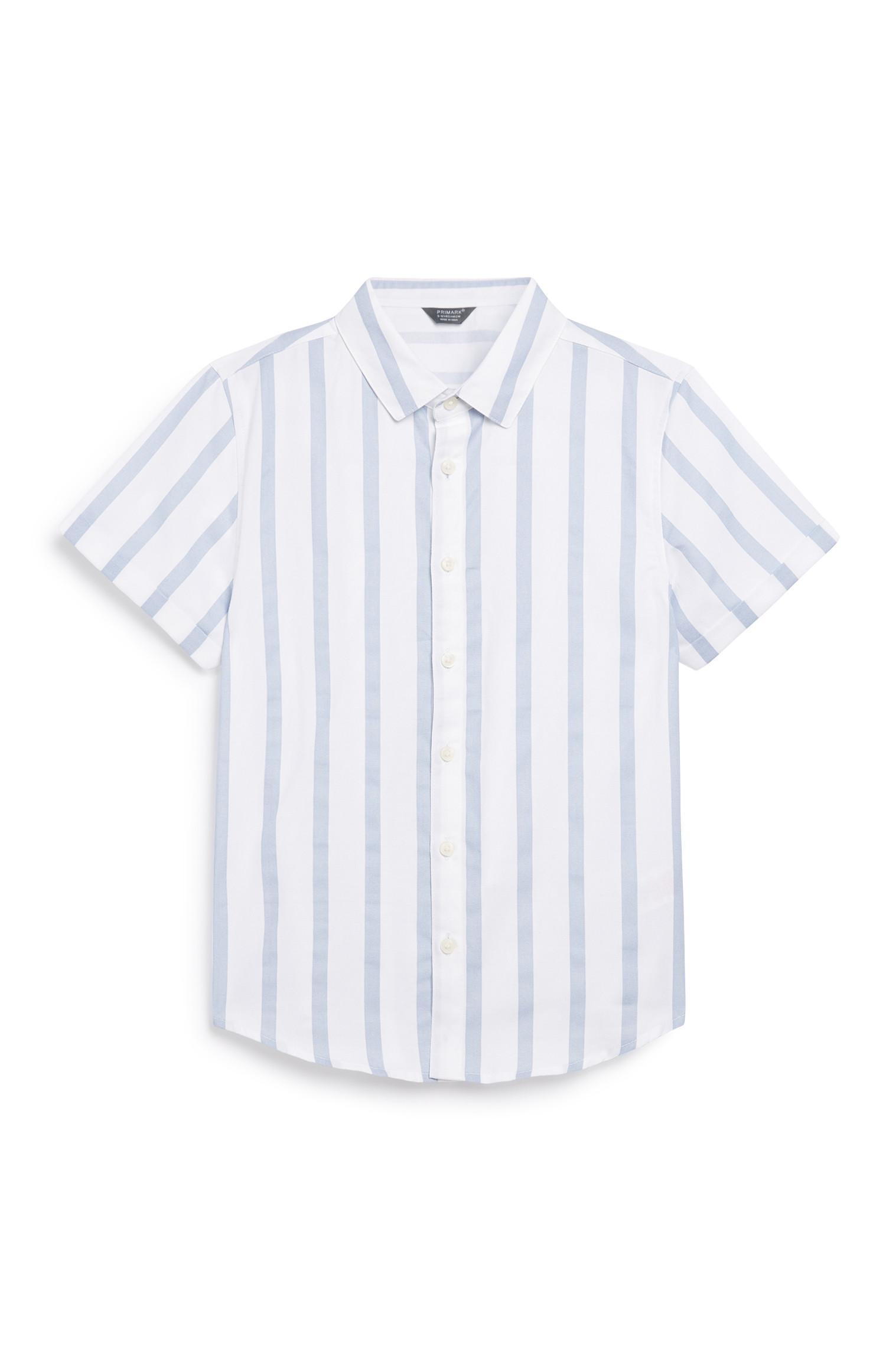 Camisa blanca de rayas para niño mayor