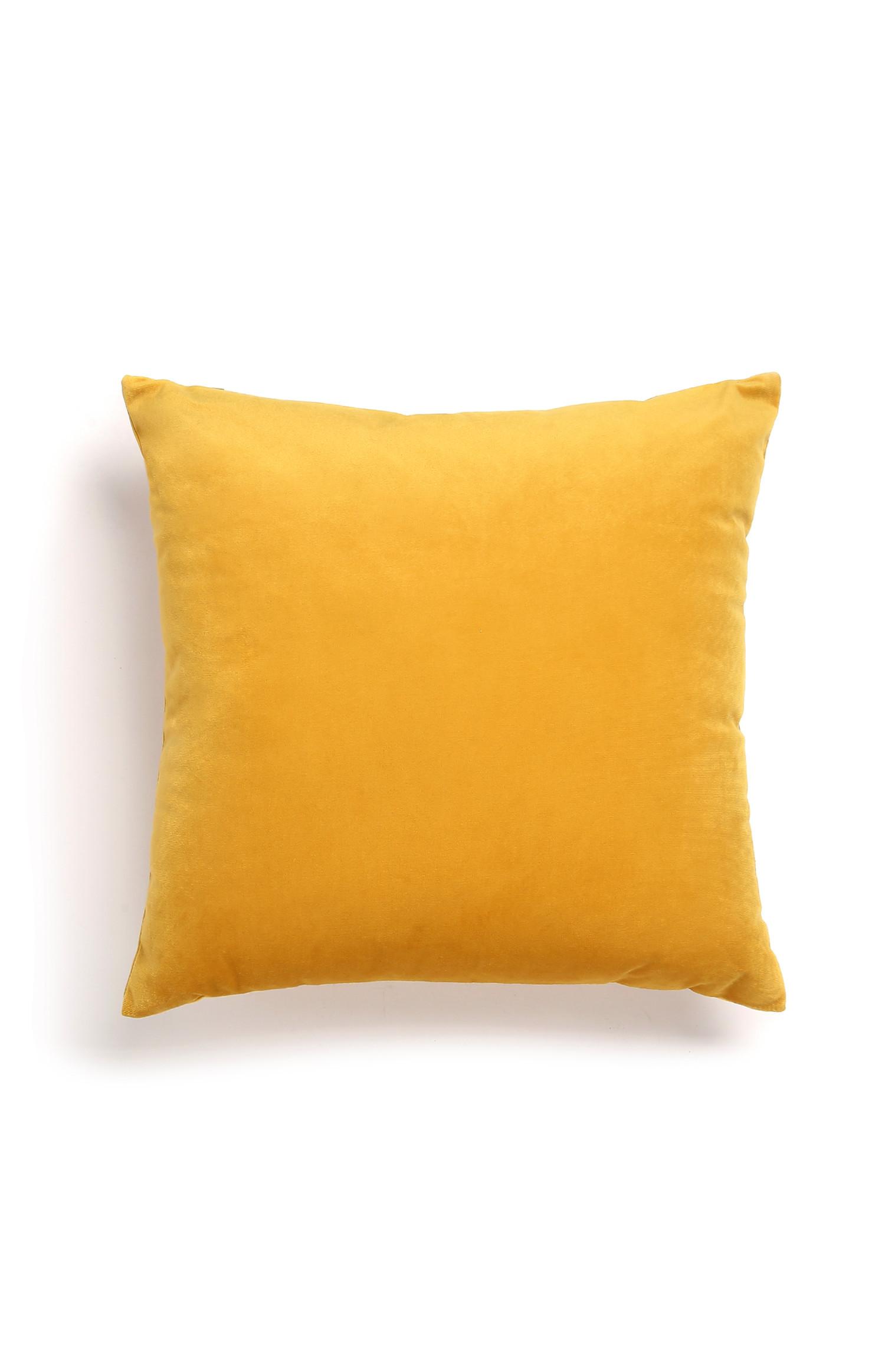 Cojín amarillo de efecto terciopelo