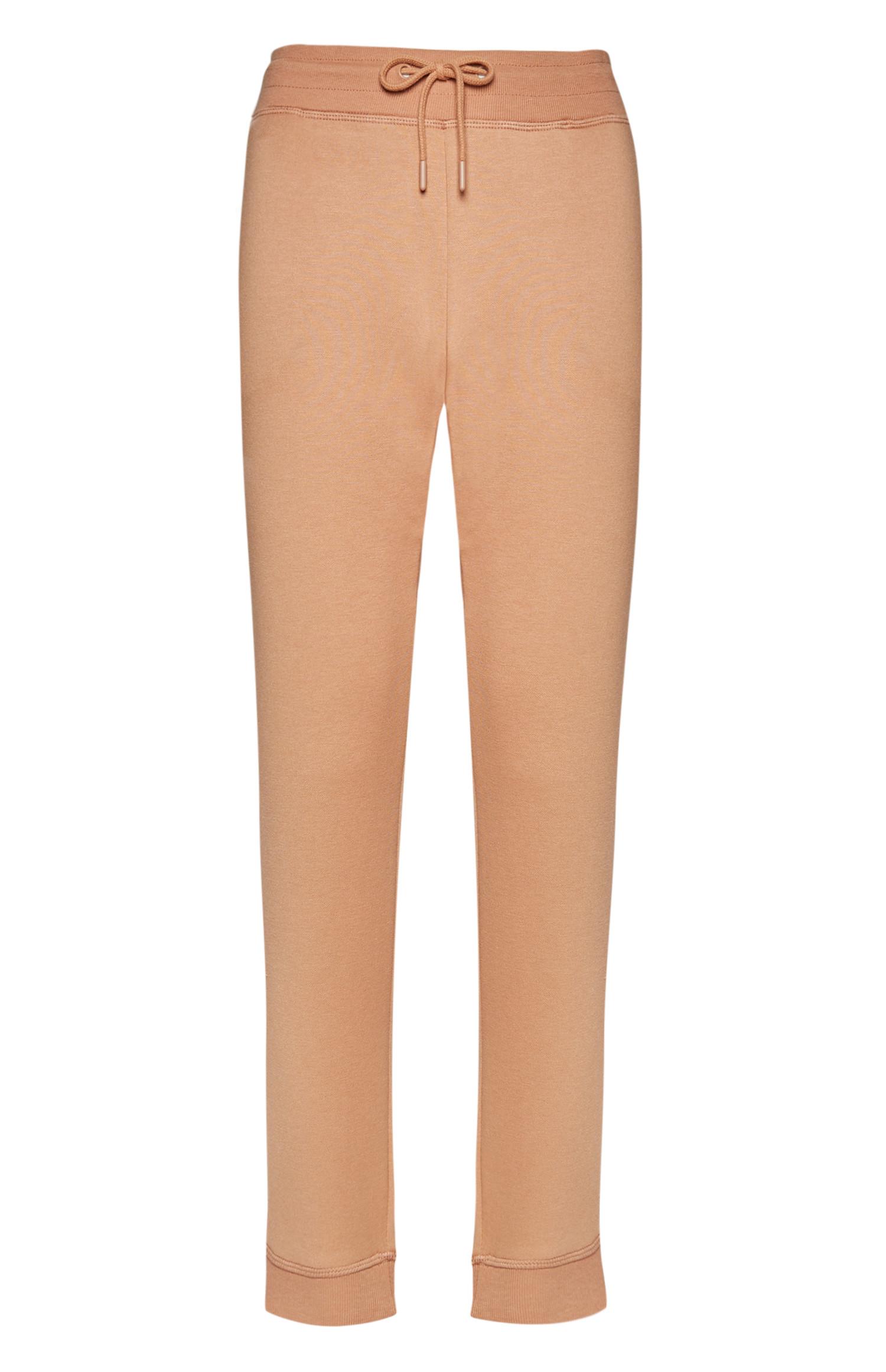 Calças desportivas nude