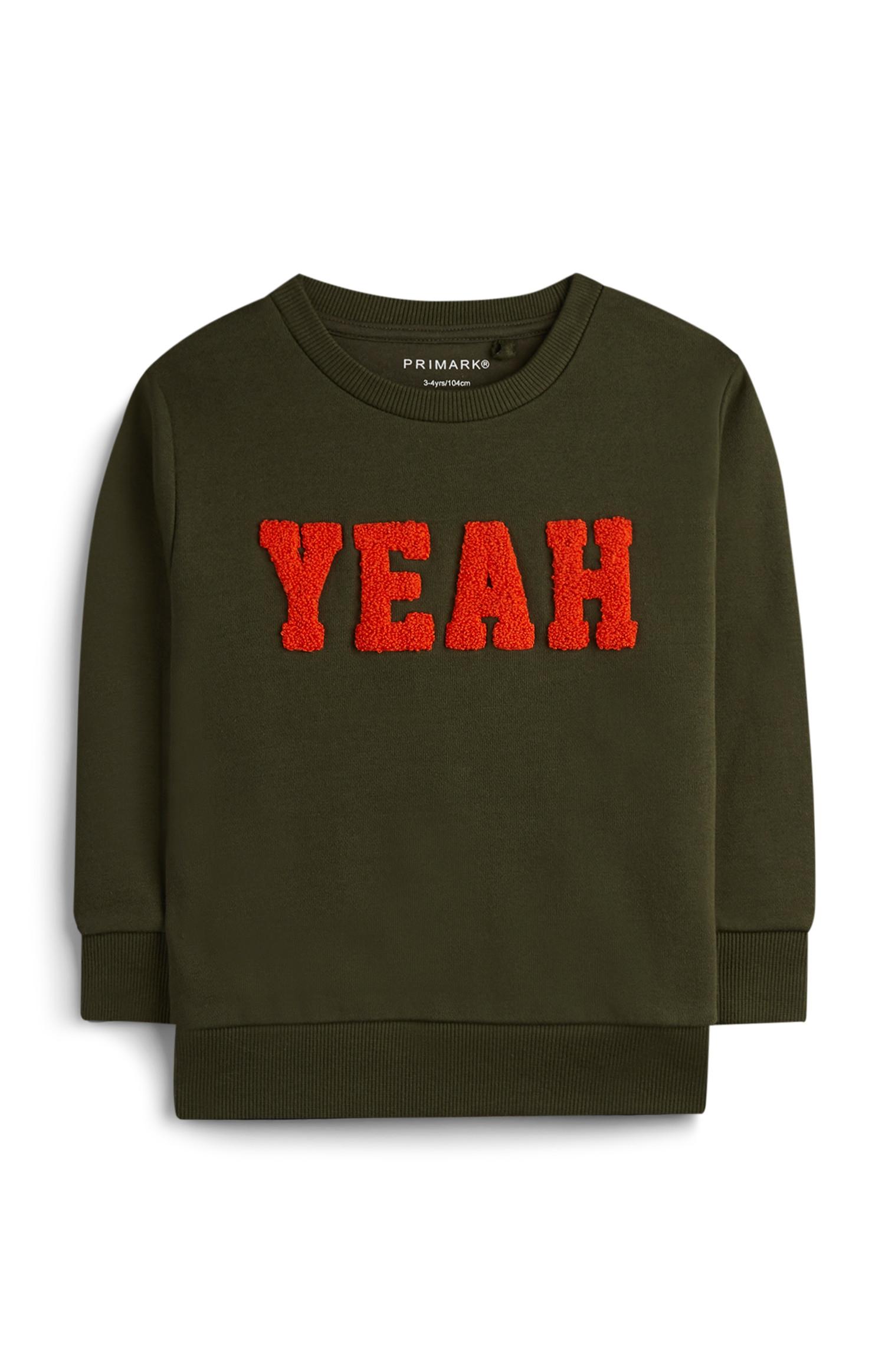 Jersey verde con mensaje para niño pequeño