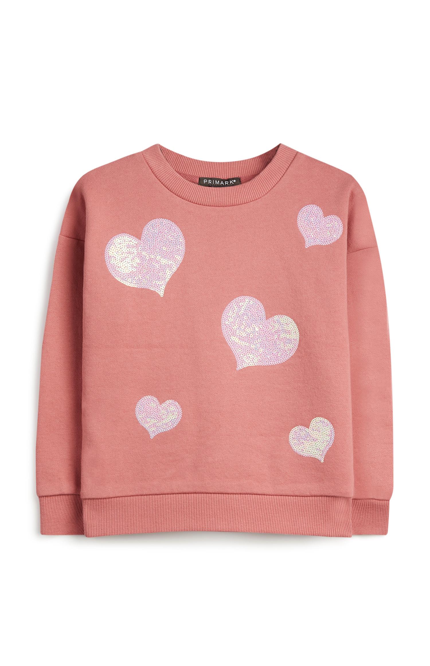 Jersey rosa con lentejuelas para niña pequeña