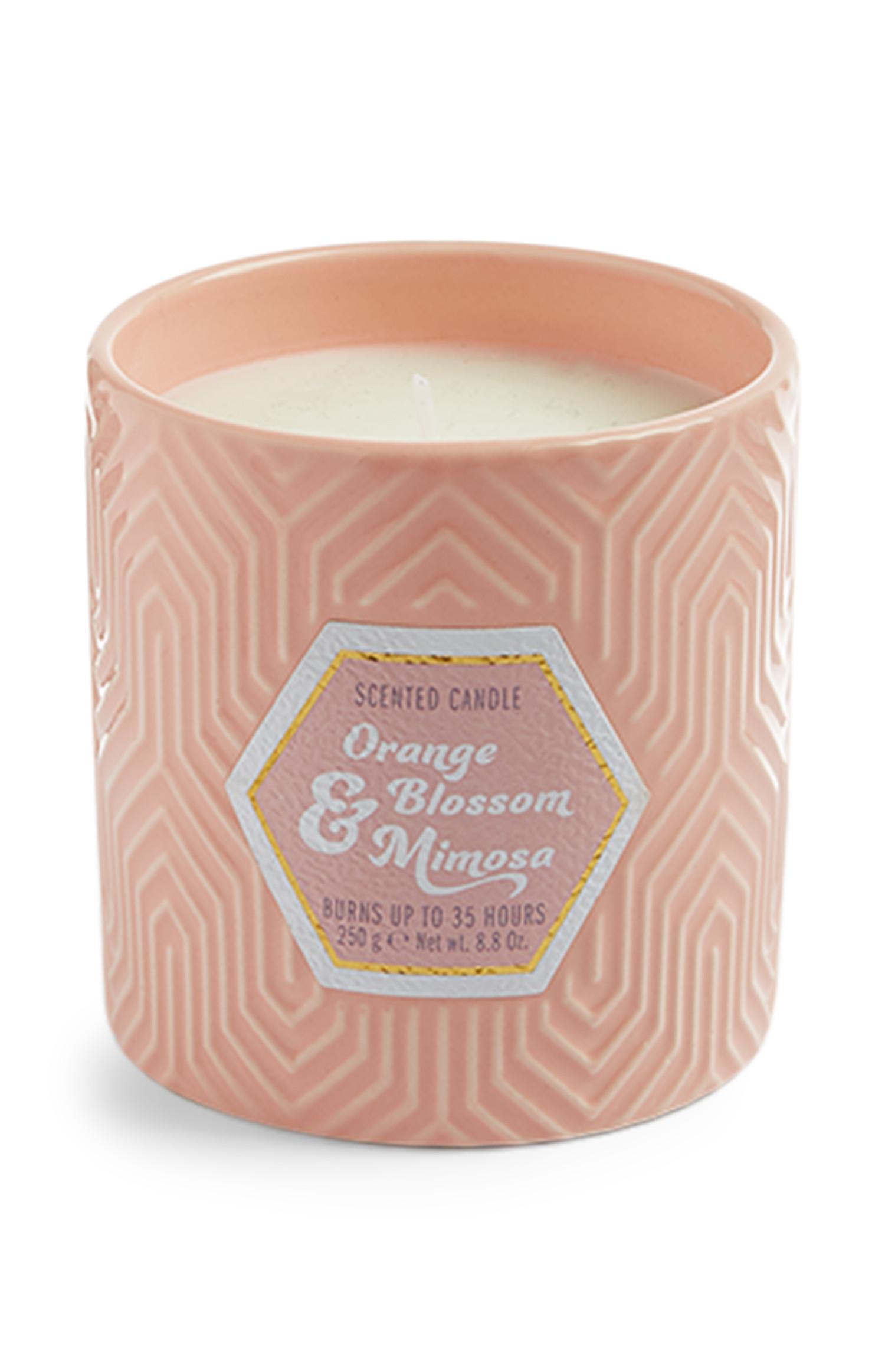 Rožnata keramična sveča