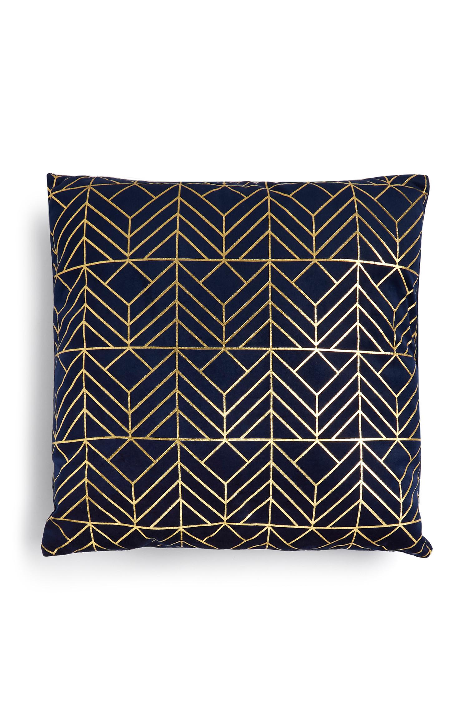 Cojín estampado azul y dorado