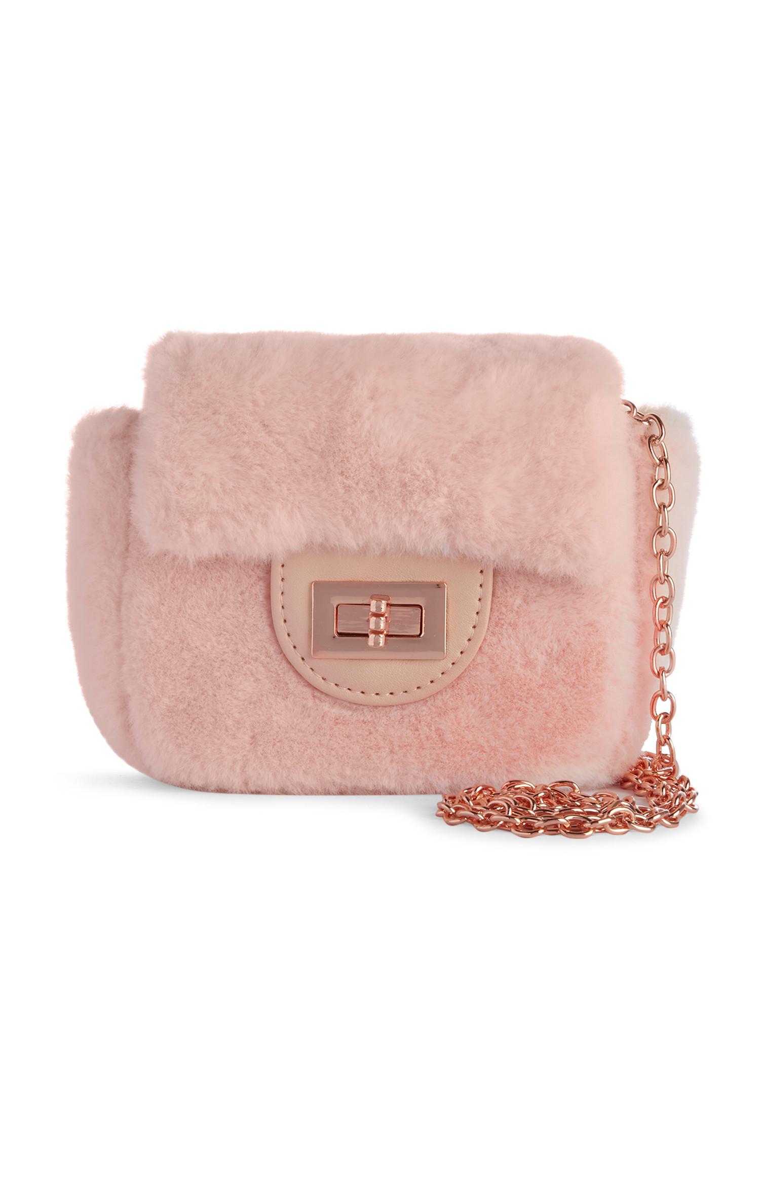 Bolso de pelo sintético rosa de niña pequeña