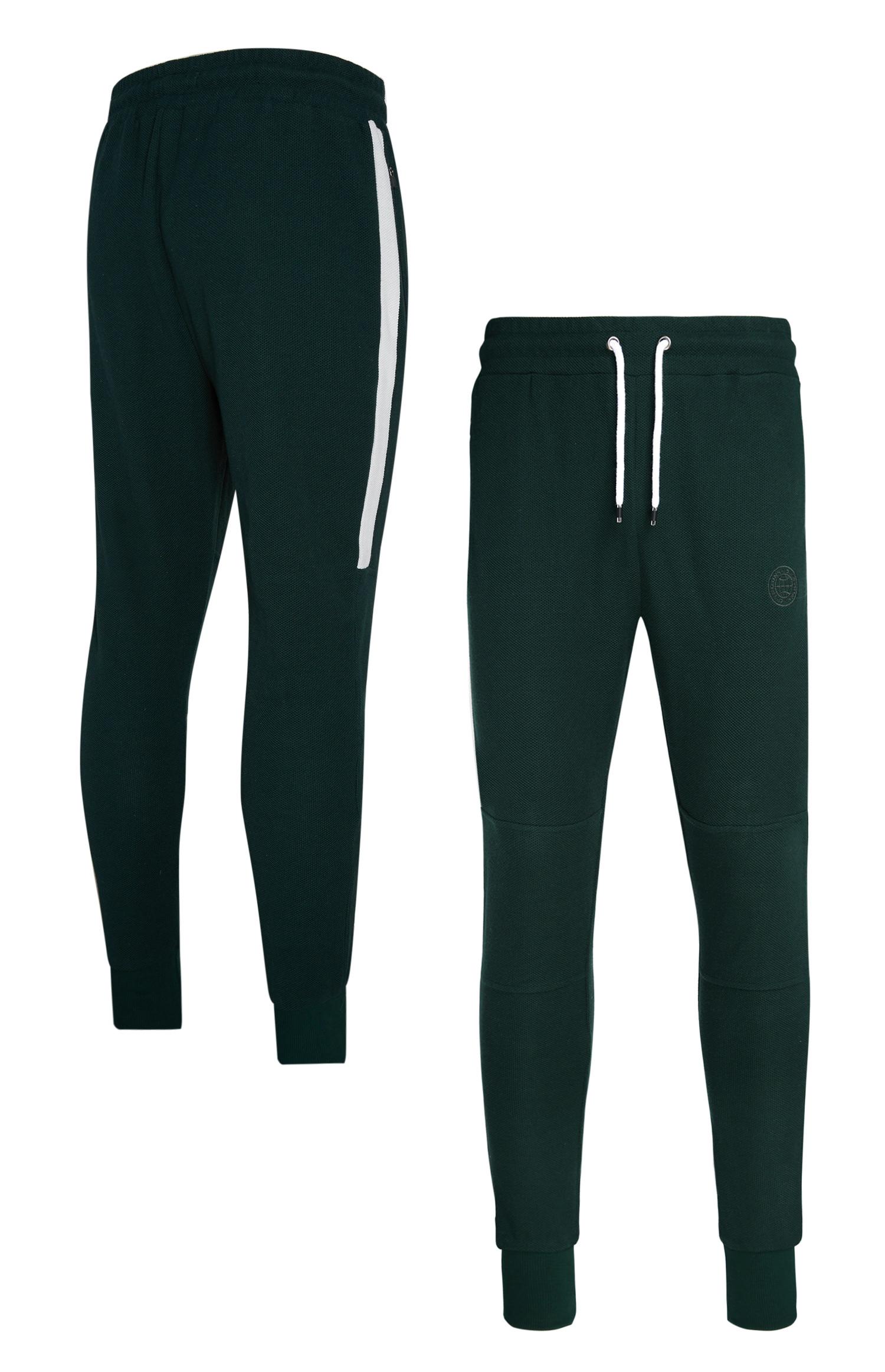 dark green jogging bottoms