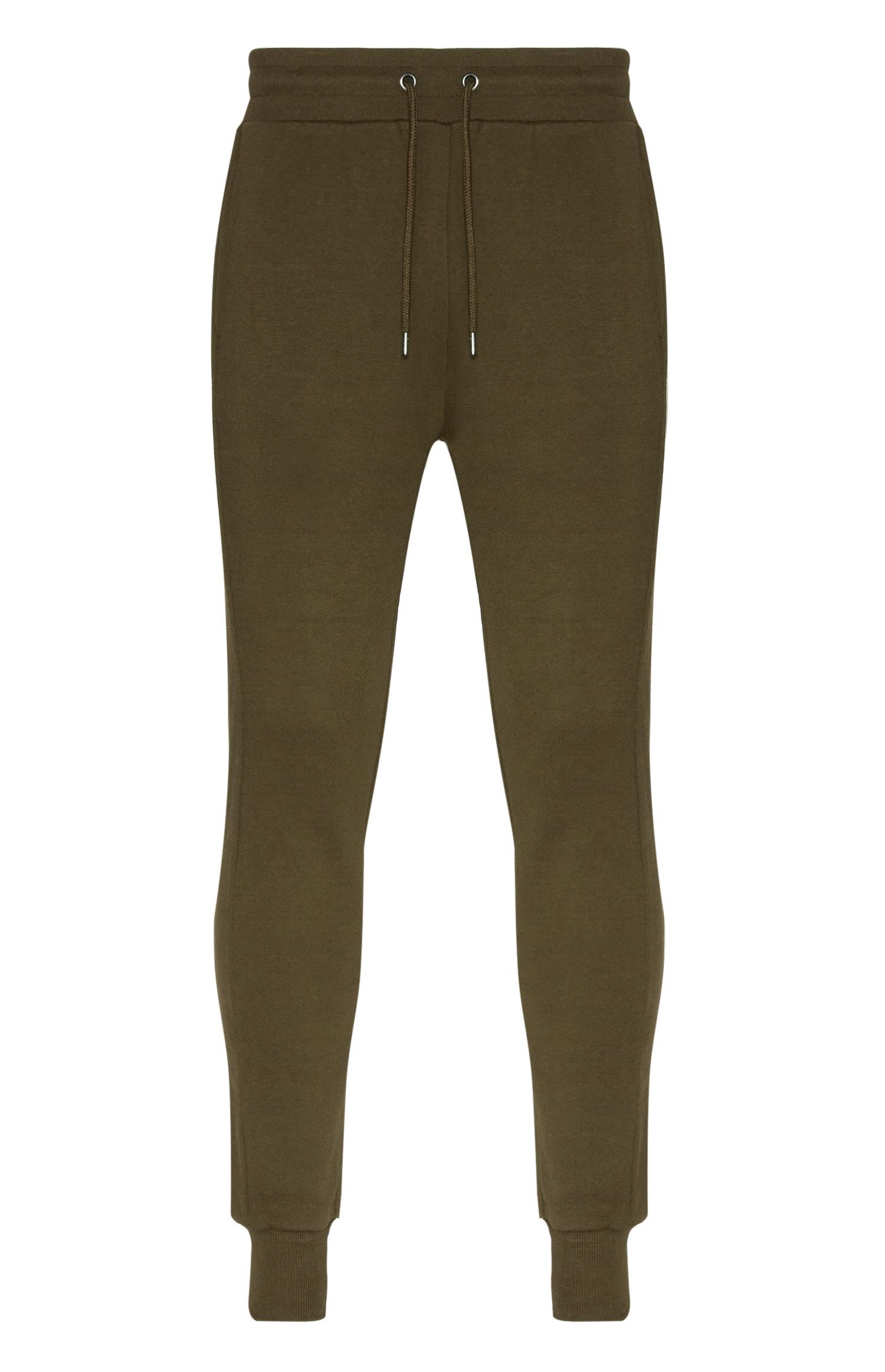 dark green jogging bottoms